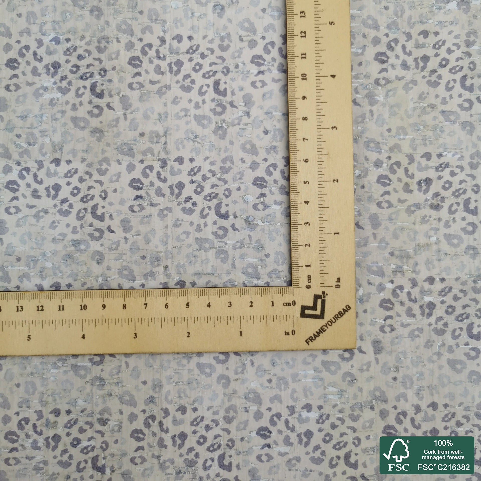 Leopard printed pattern on white cork fabric (163H)