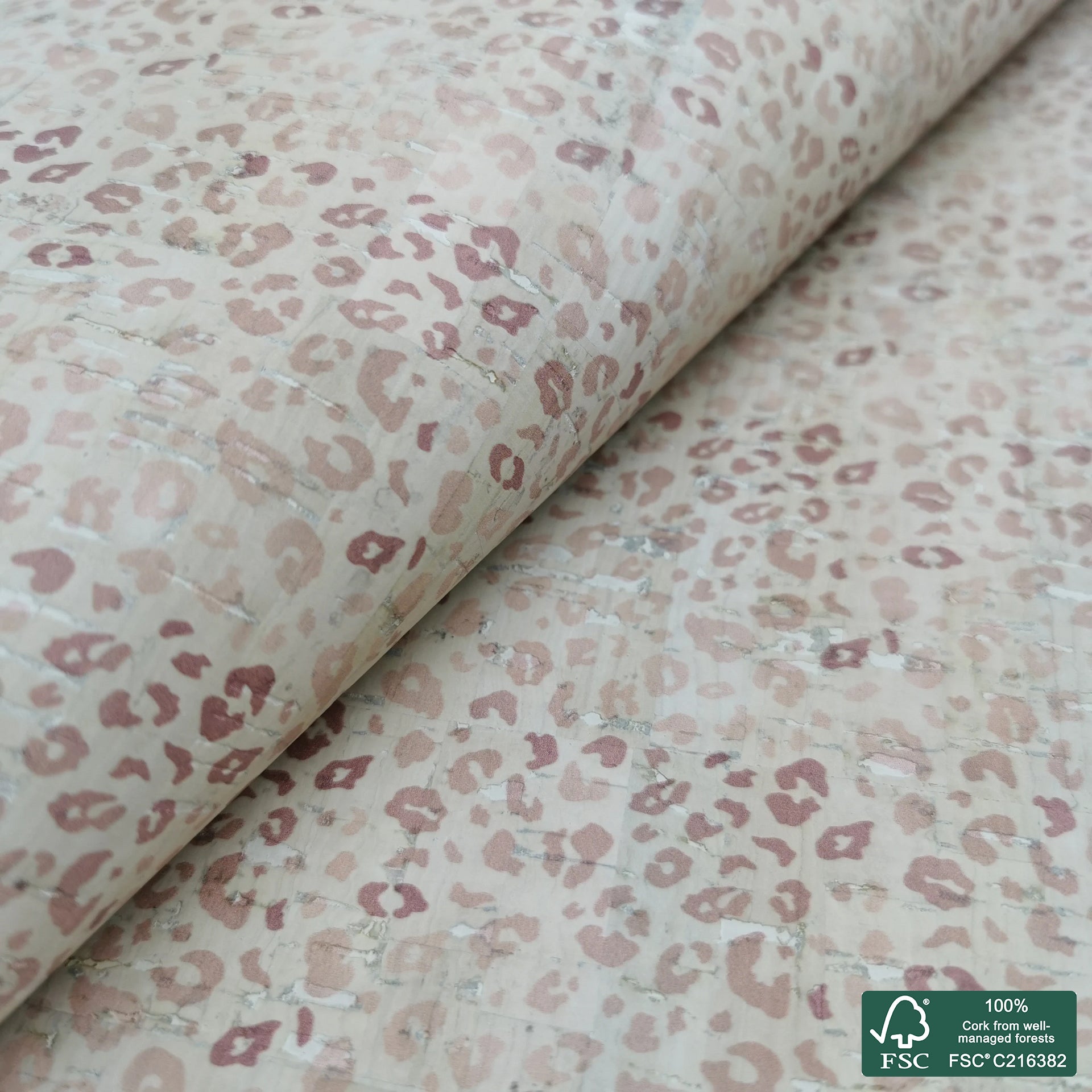 Leopard printed pattern on white cork fabric (163C)
