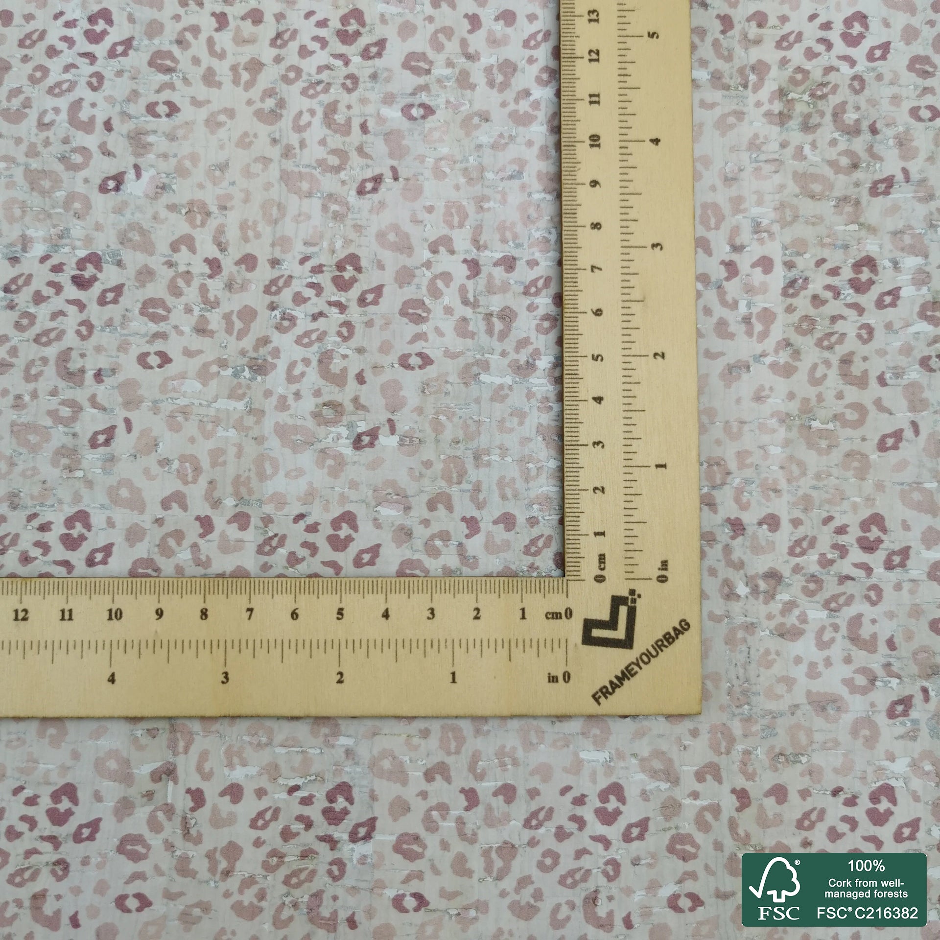 Leopard printed pattern on white cork fabric (163C)