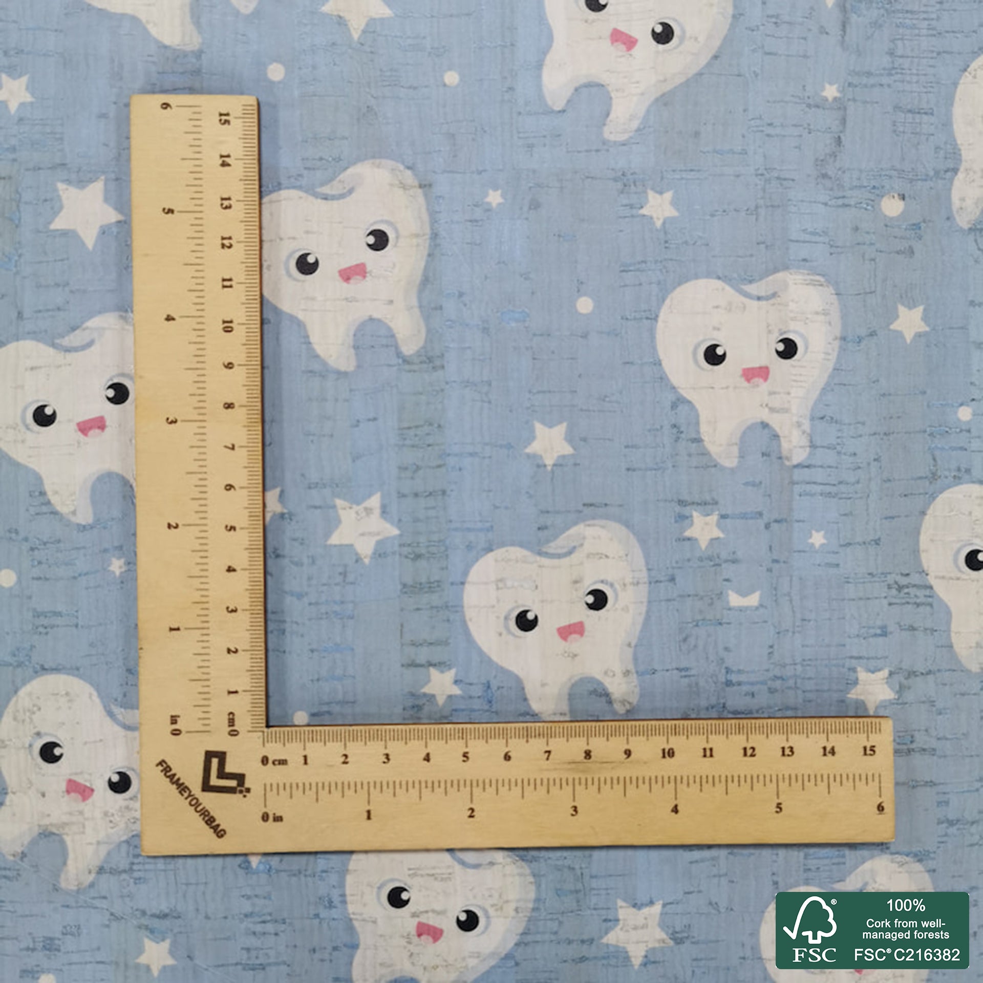 Teethes printed pattern on white cork fabric (188)