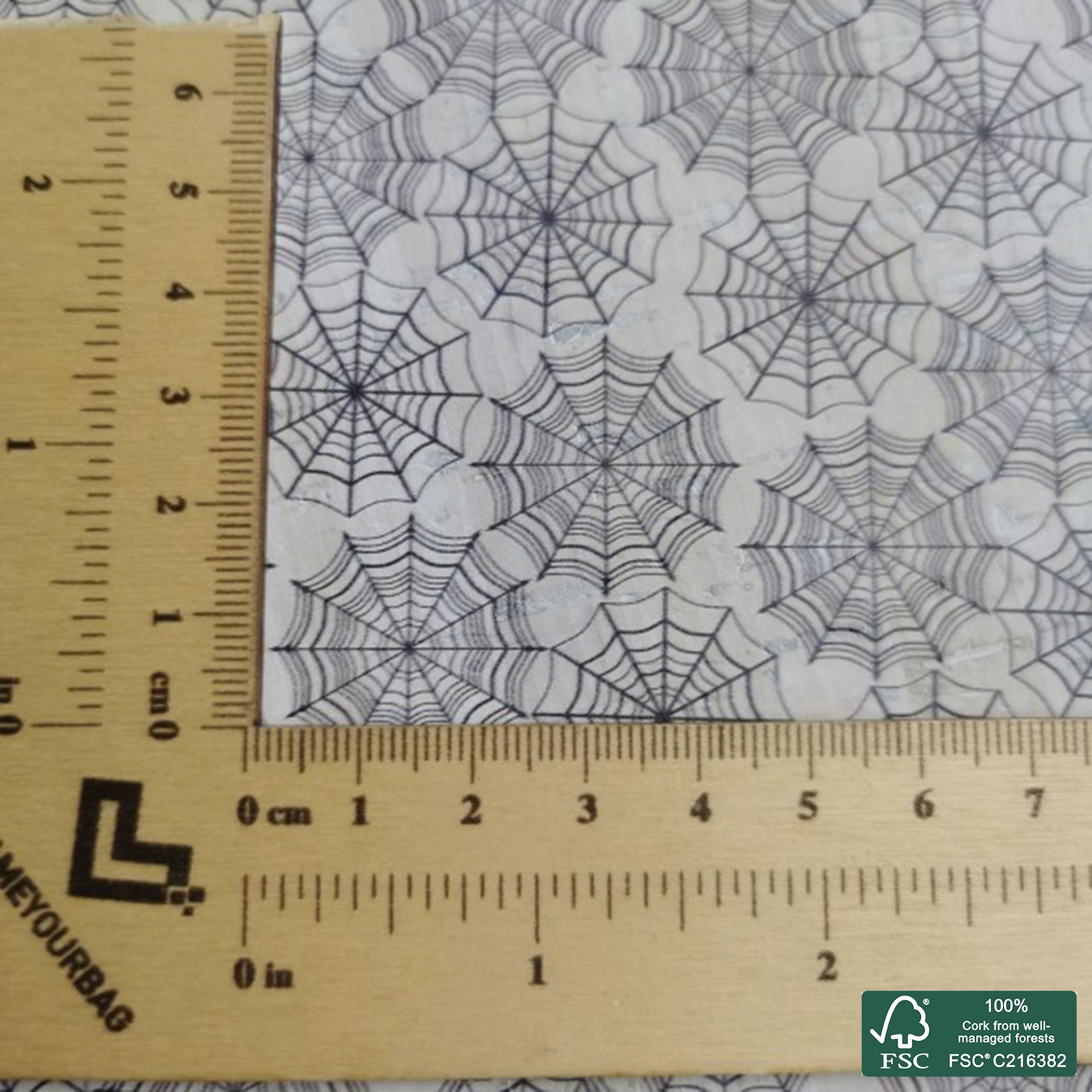 Cobwebs printed pattern on white cork fabric (202)