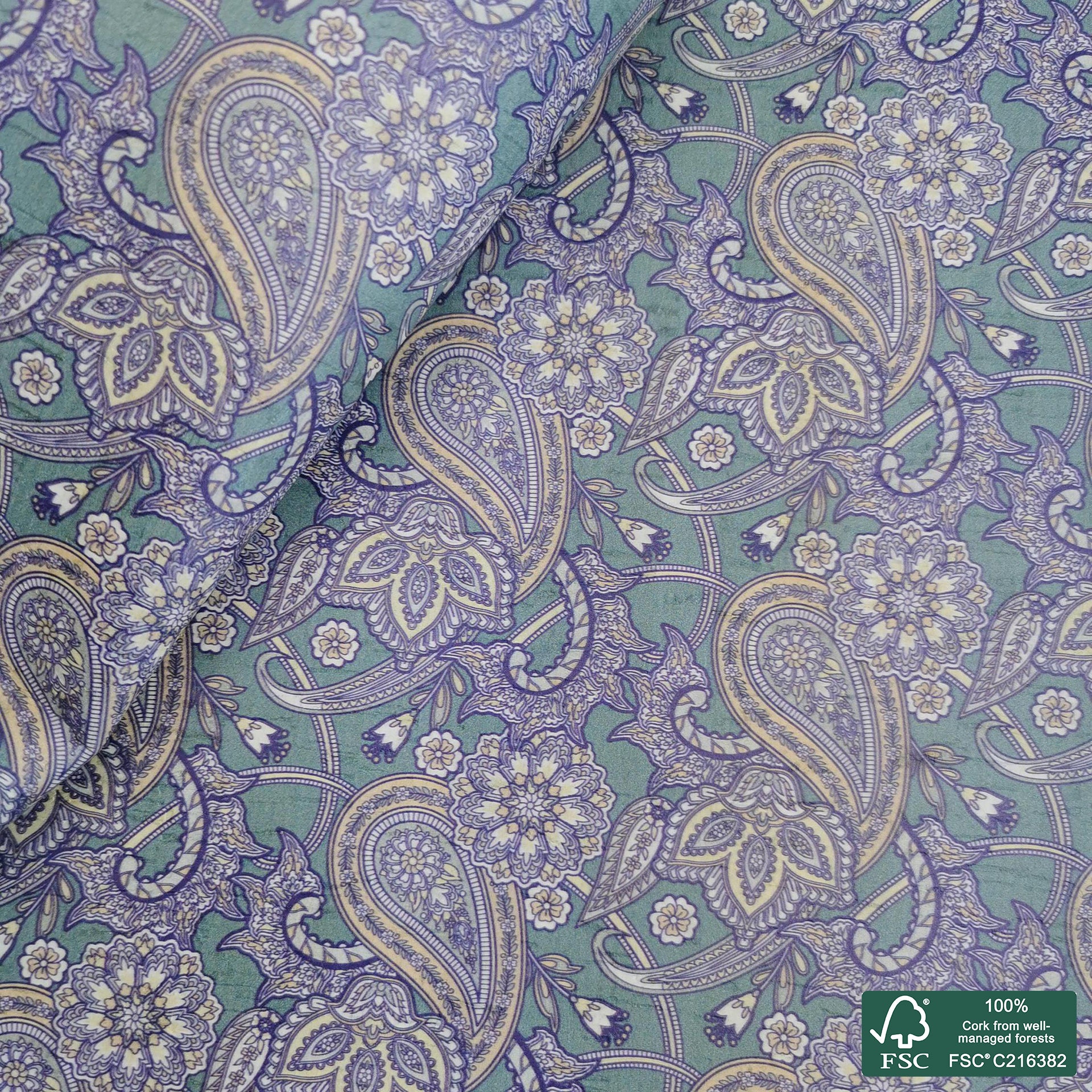 Paisley printed pattern on white cork fabric (485)