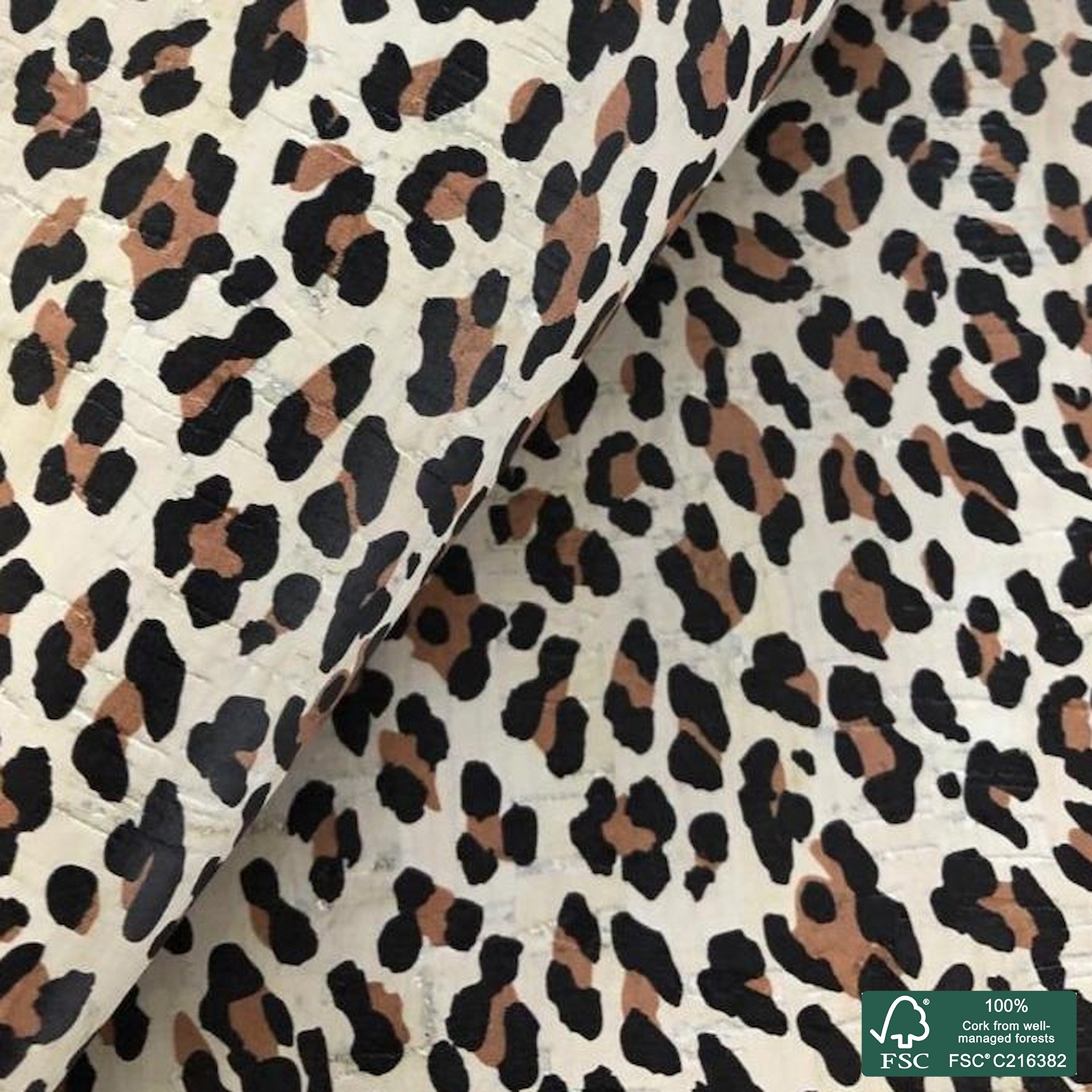 Leopard printed pattern on white cork fabric (534)