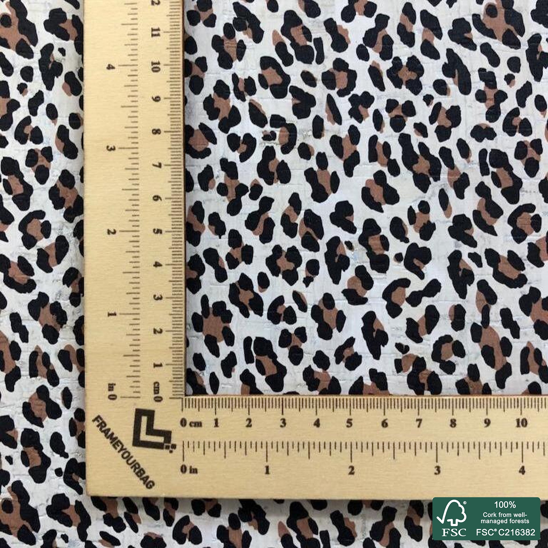 Leopard printed pattern on white cork fabric (534)