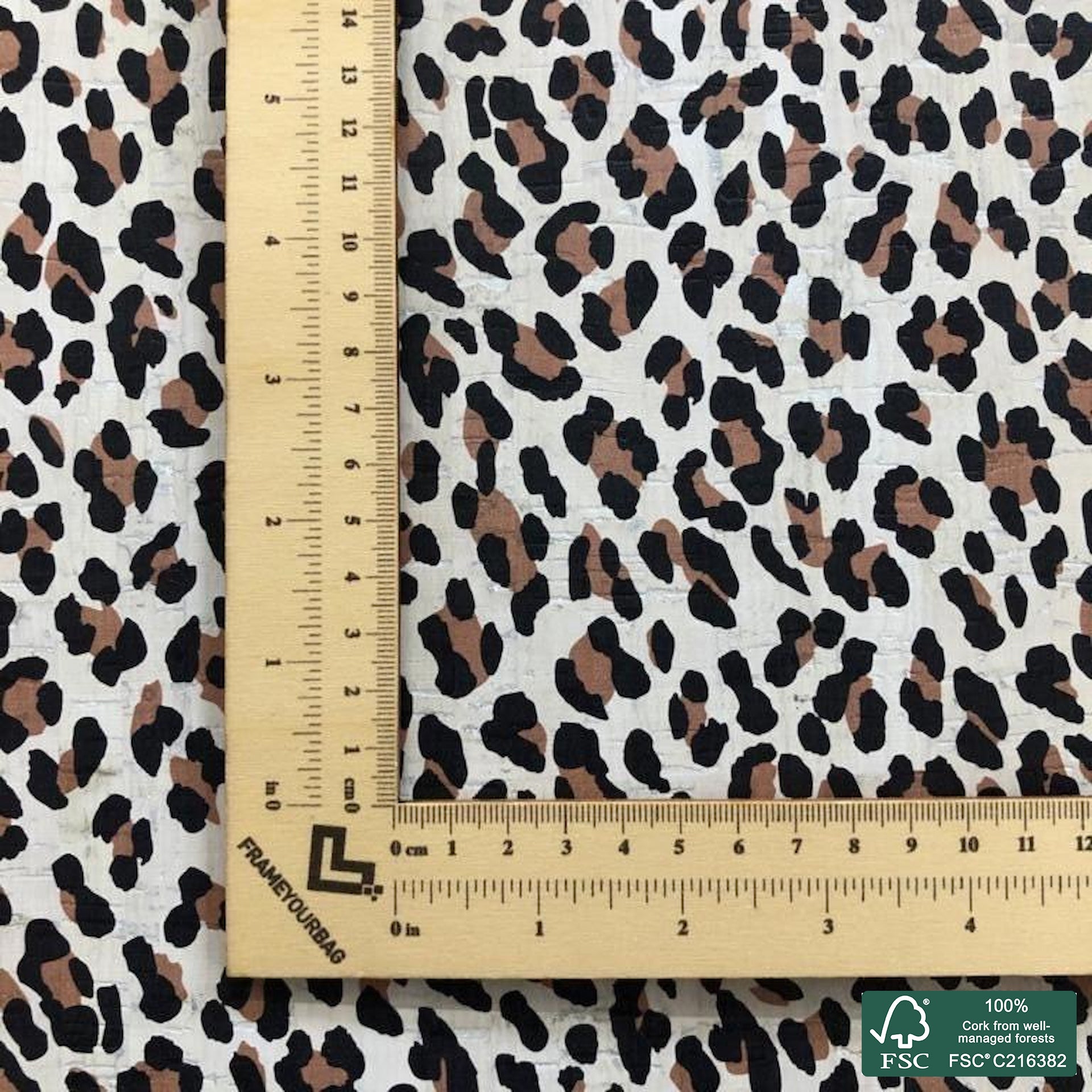 Leopard printed pattern on white cork fabric (535)