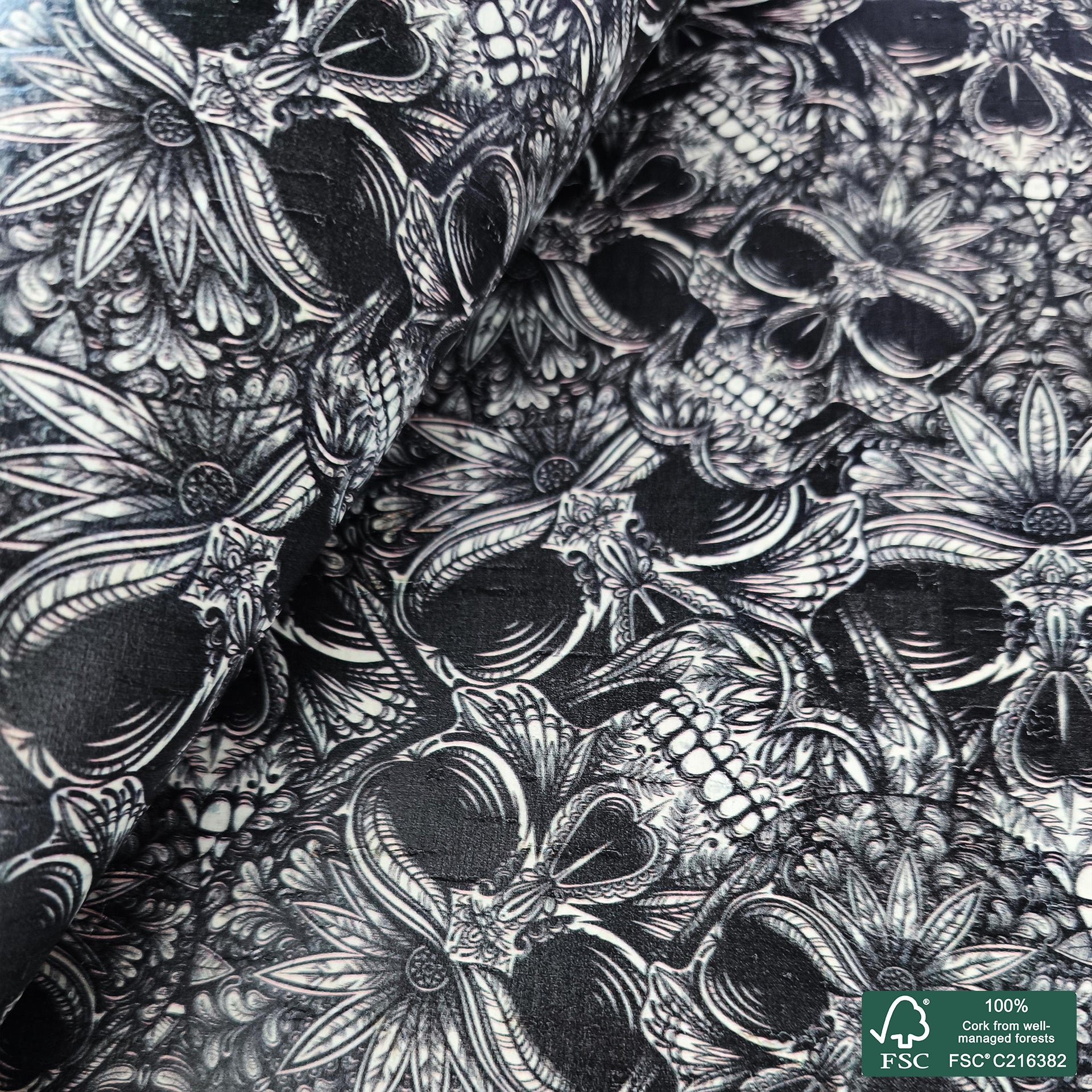 Skulls printed pattern on white cork fabric (562)