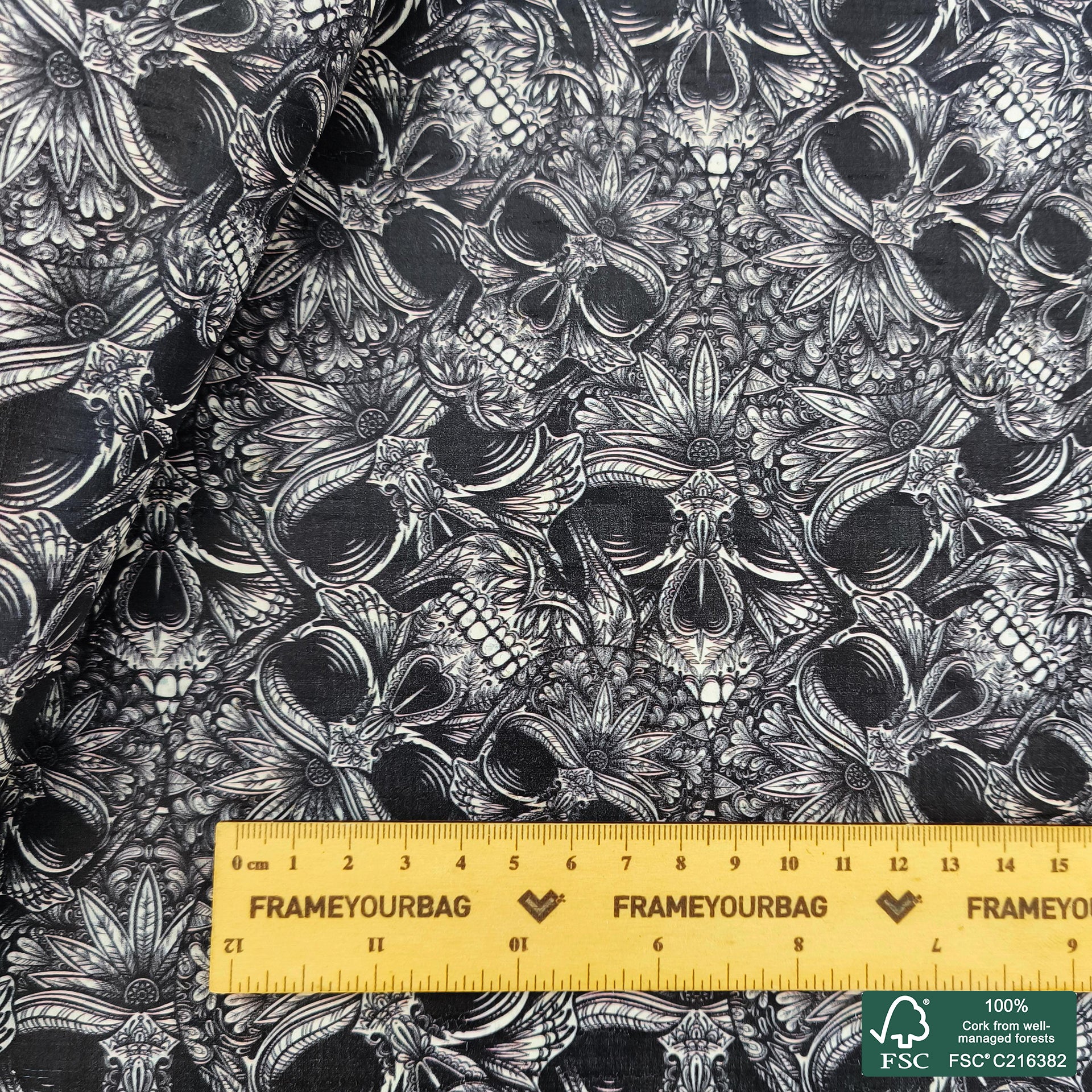 Skulls printed pattern on white cork fabric (562)