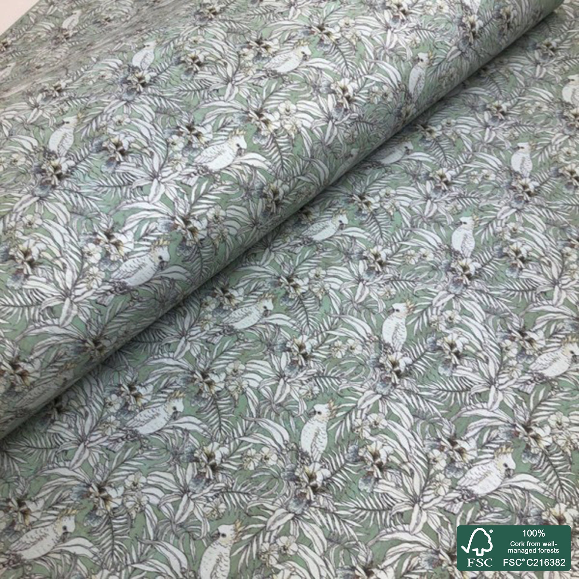 Parrot printed pattern on green aqua cork fabric (151)