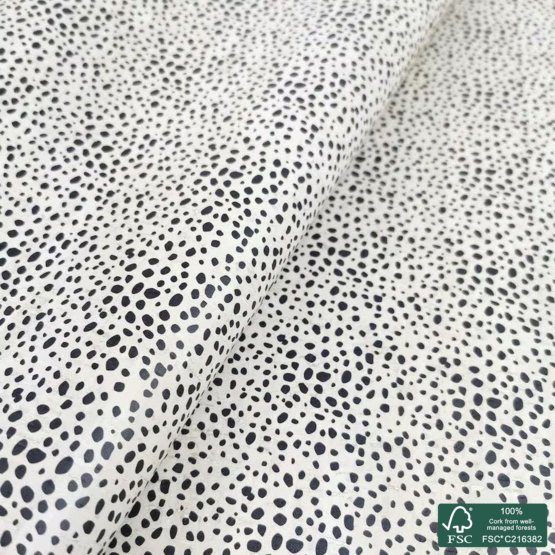 Dalmatian printed pattern on white cork fabric (412)