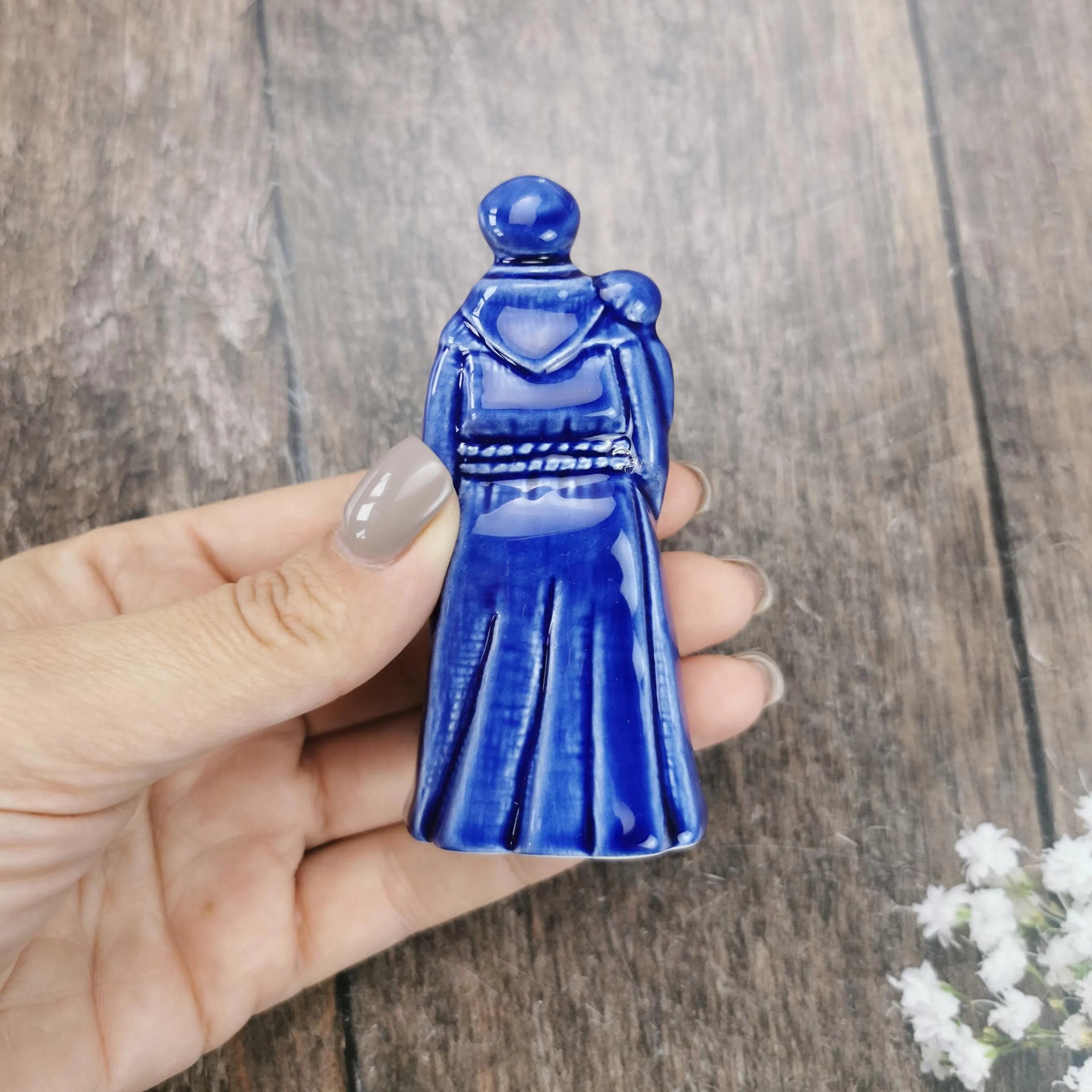 Blue faience figure of Saint Anthony