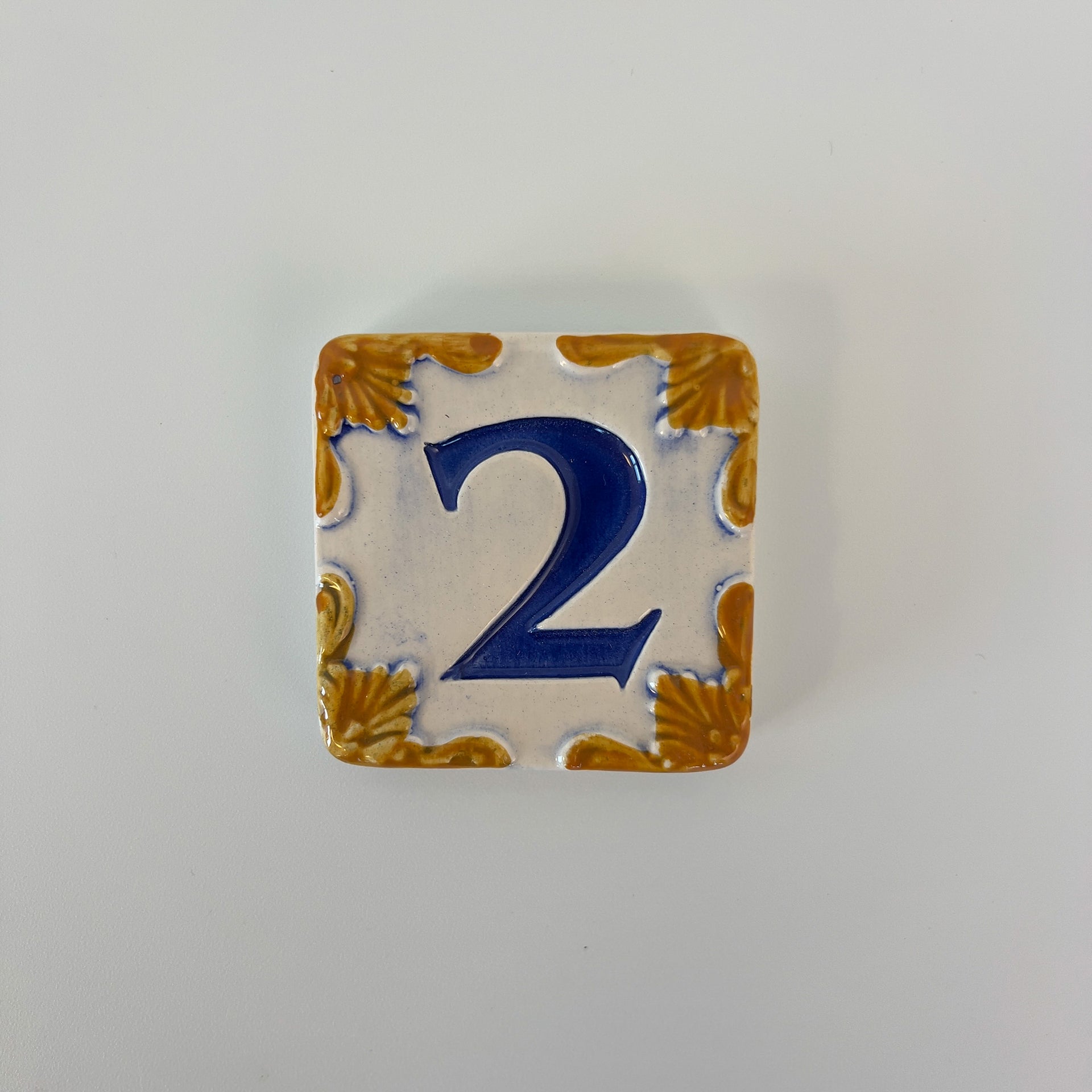 Ceramic door number and letter tile