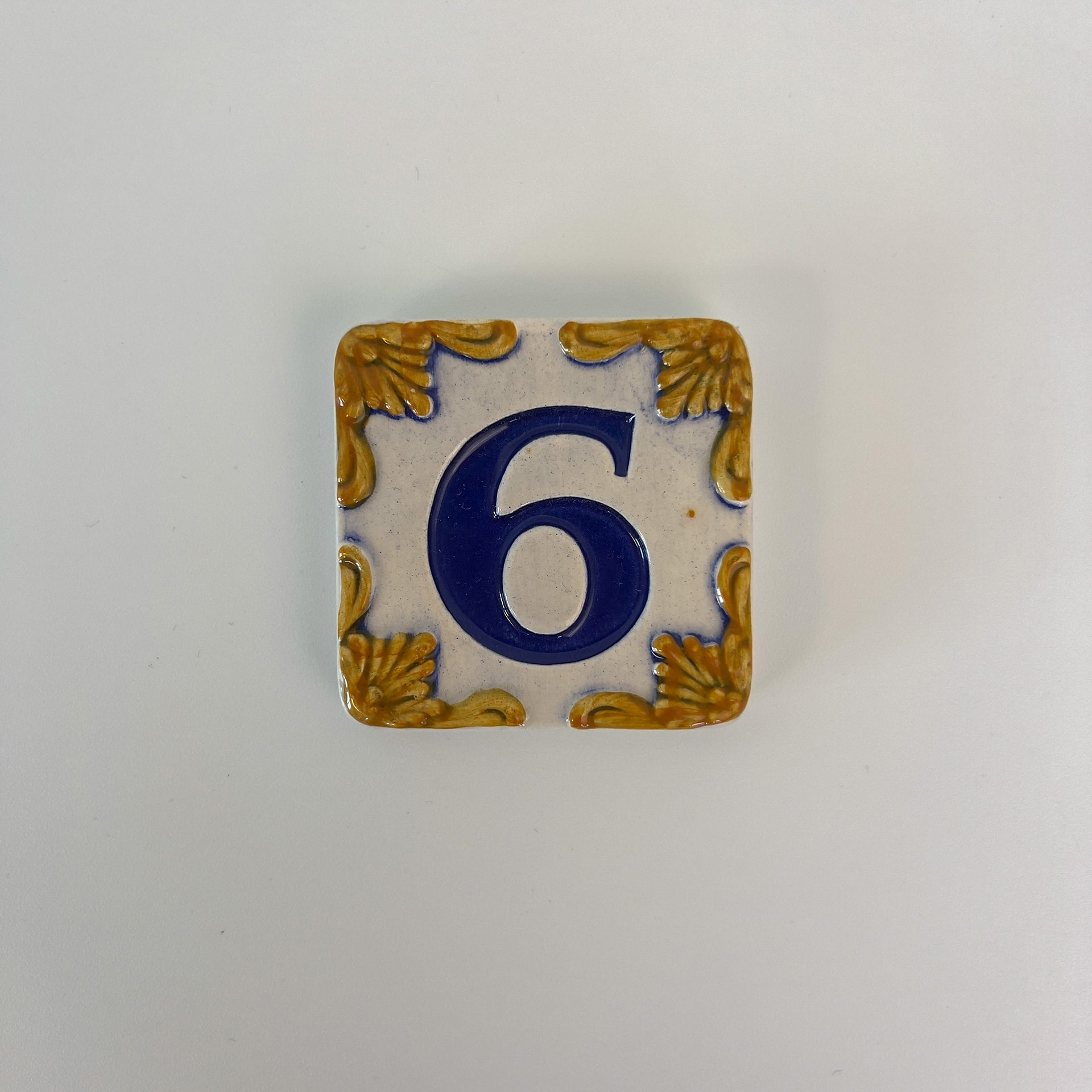 Ceramic door number and letter tile