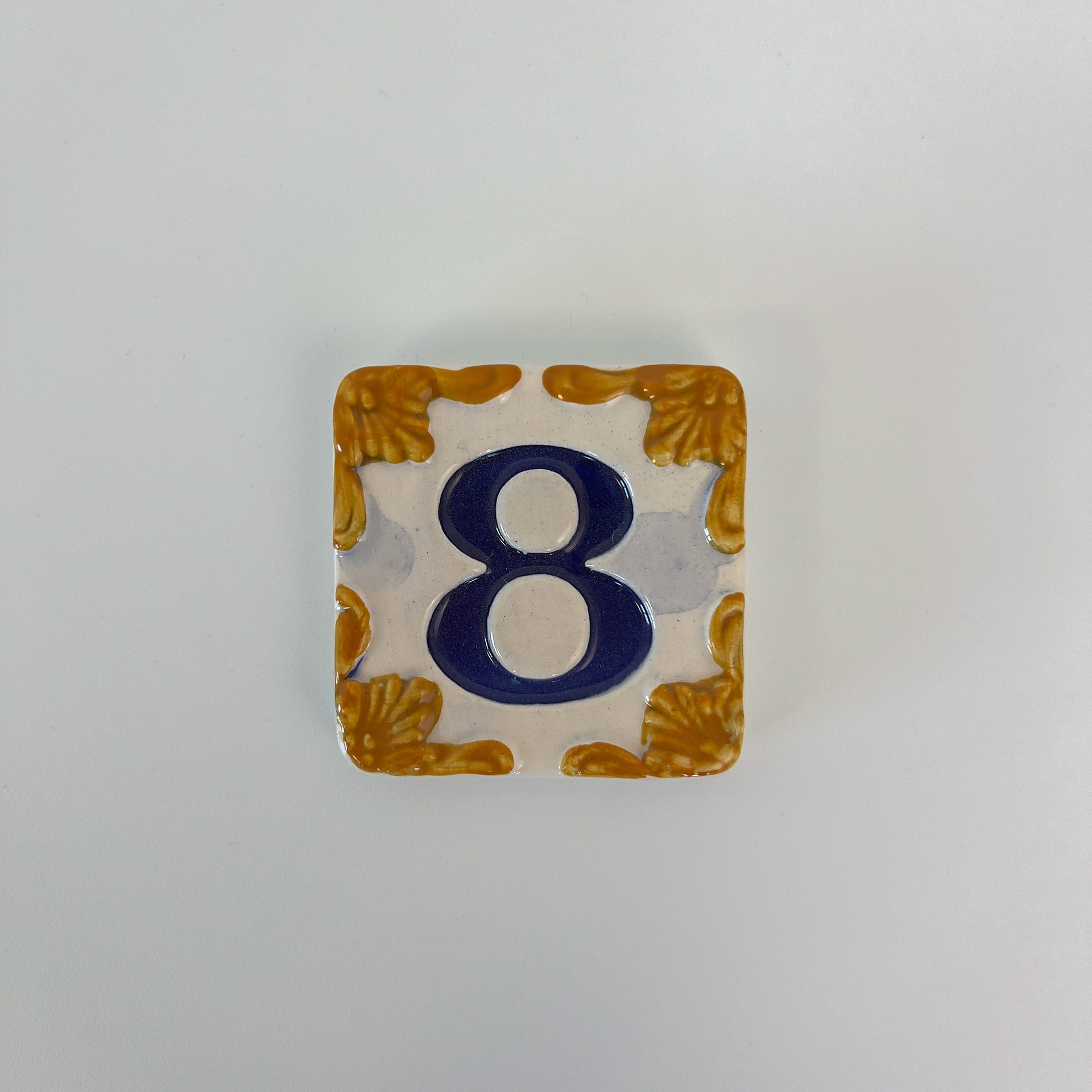 Ceramic door number and letter tile