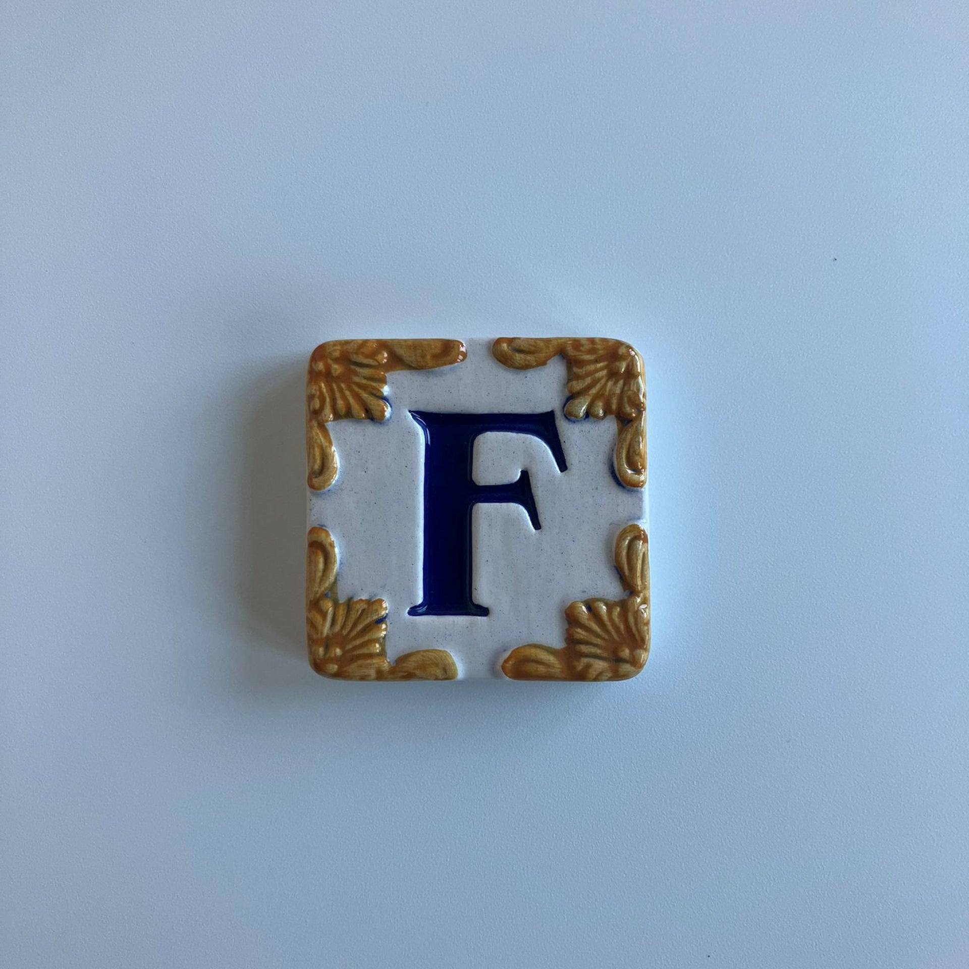 Ceramic door number and letter tile