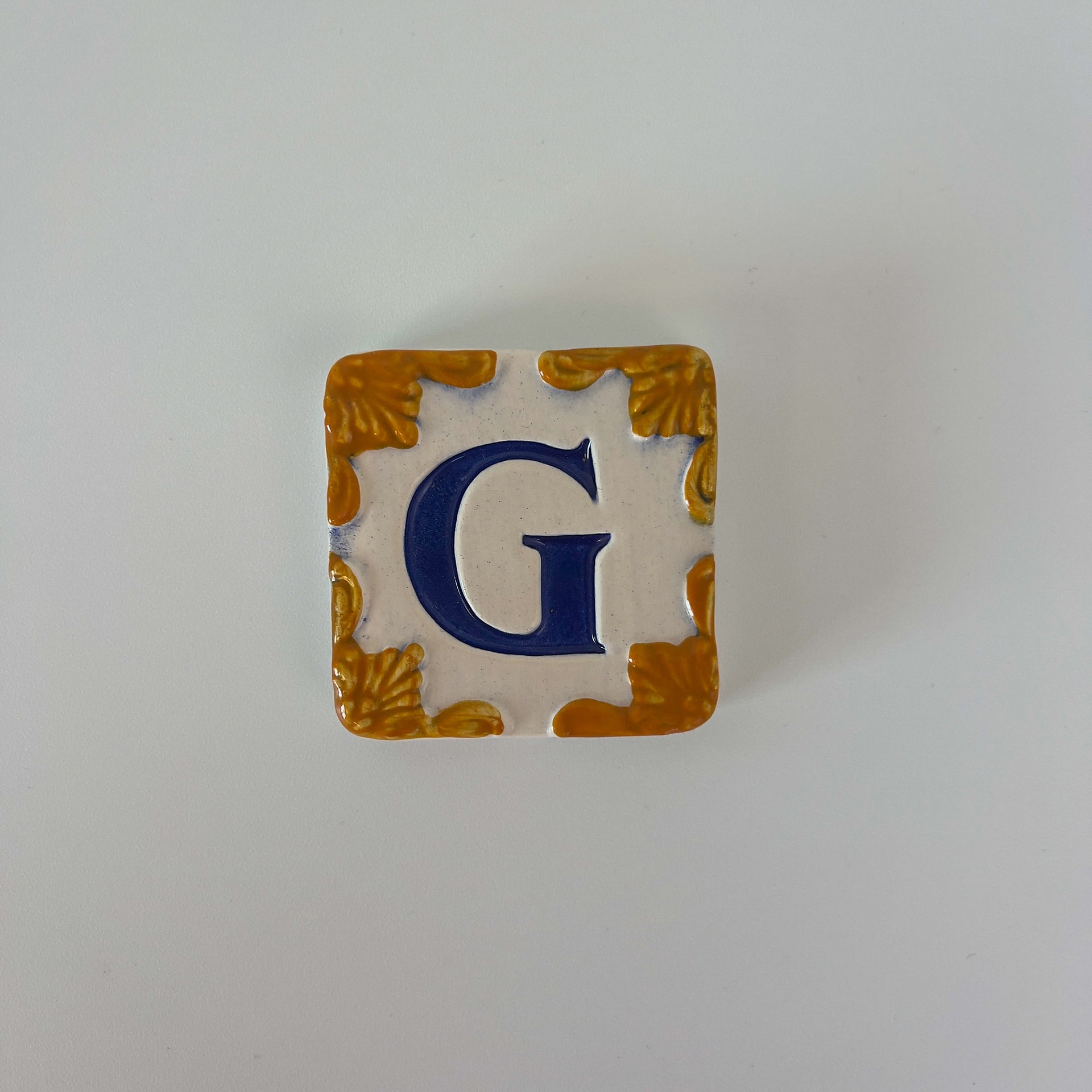 Ceramic door number and letter tile