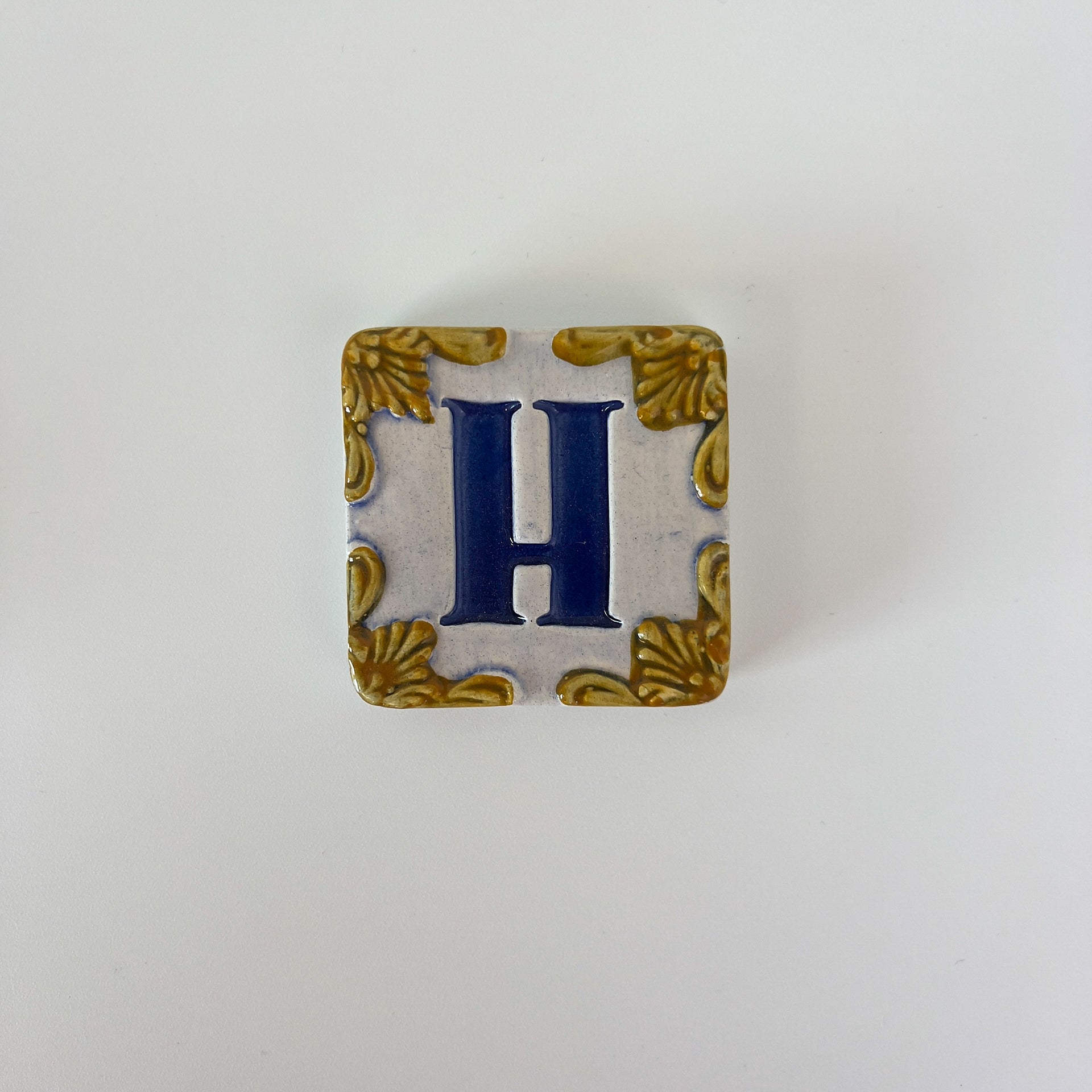 Ceramic door number and letter tile