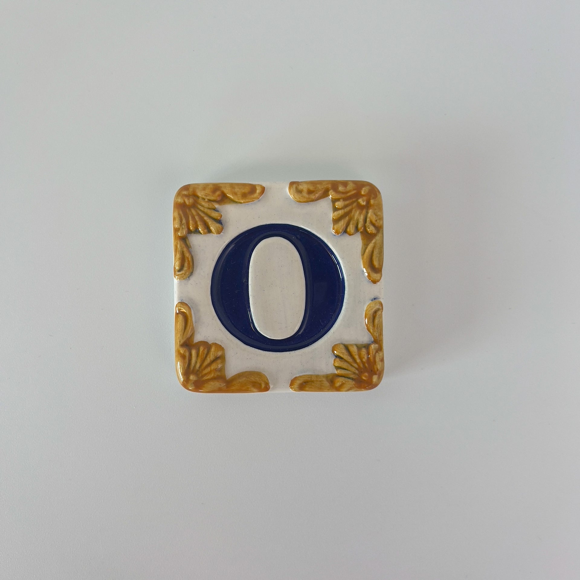 Ceramic door number and letter tile