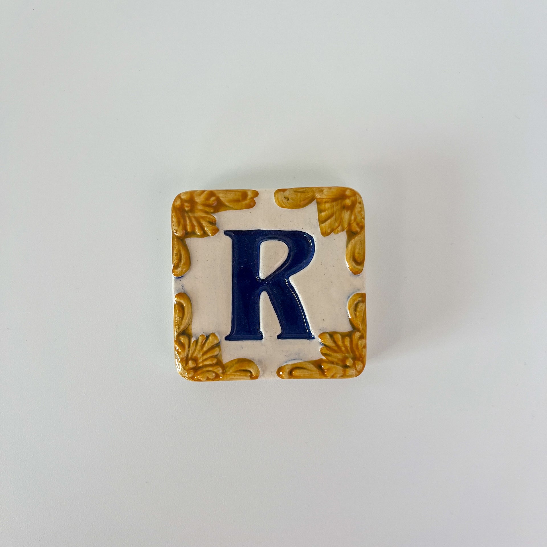 Ceramic door number and letter tile