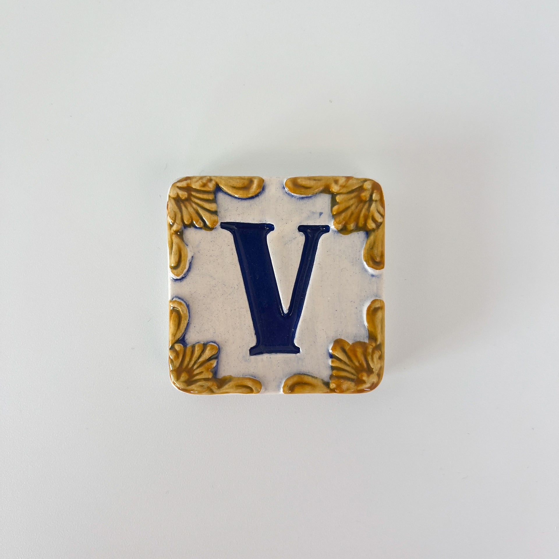 Ceramic door number and letter tile