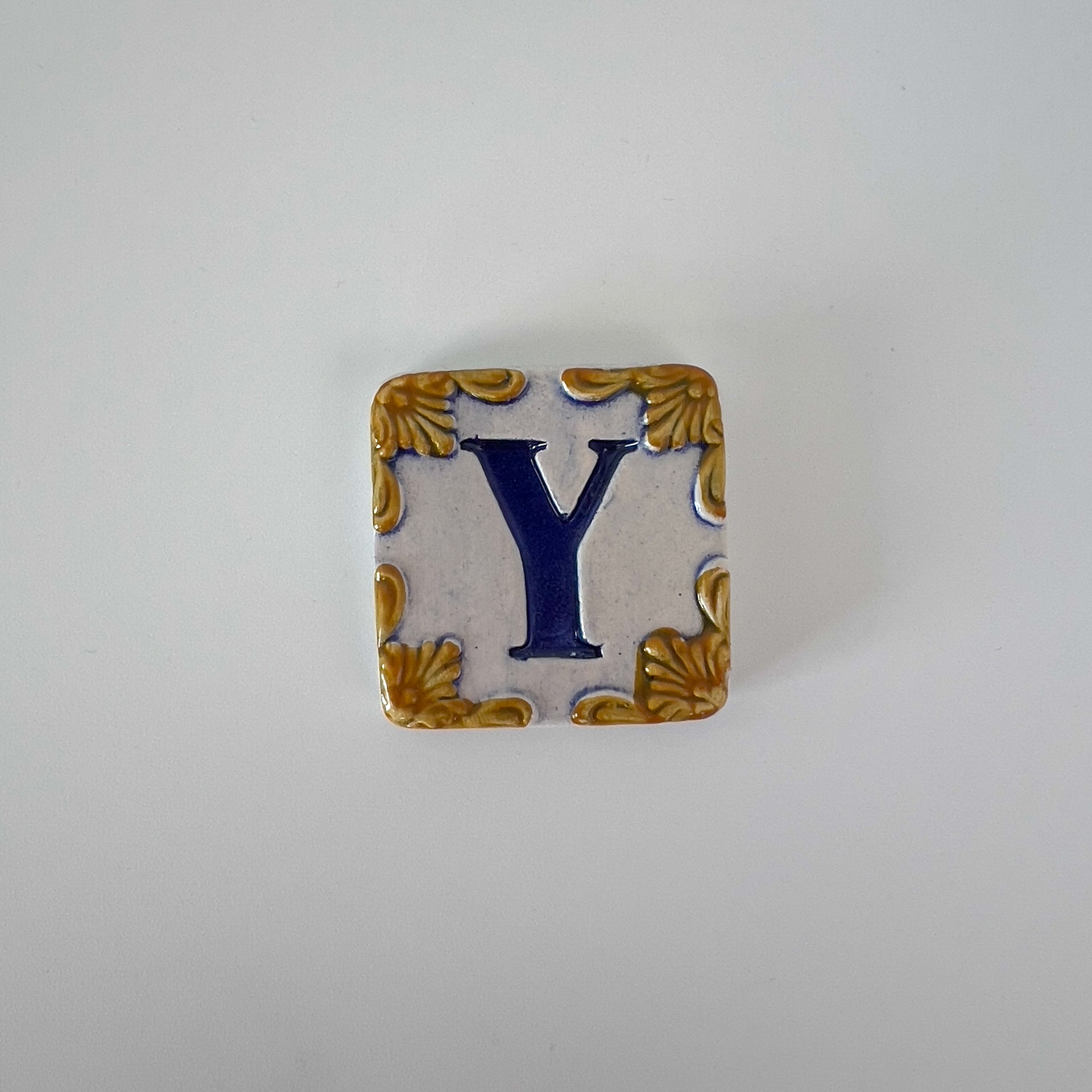 Ceramic door number and letter tile