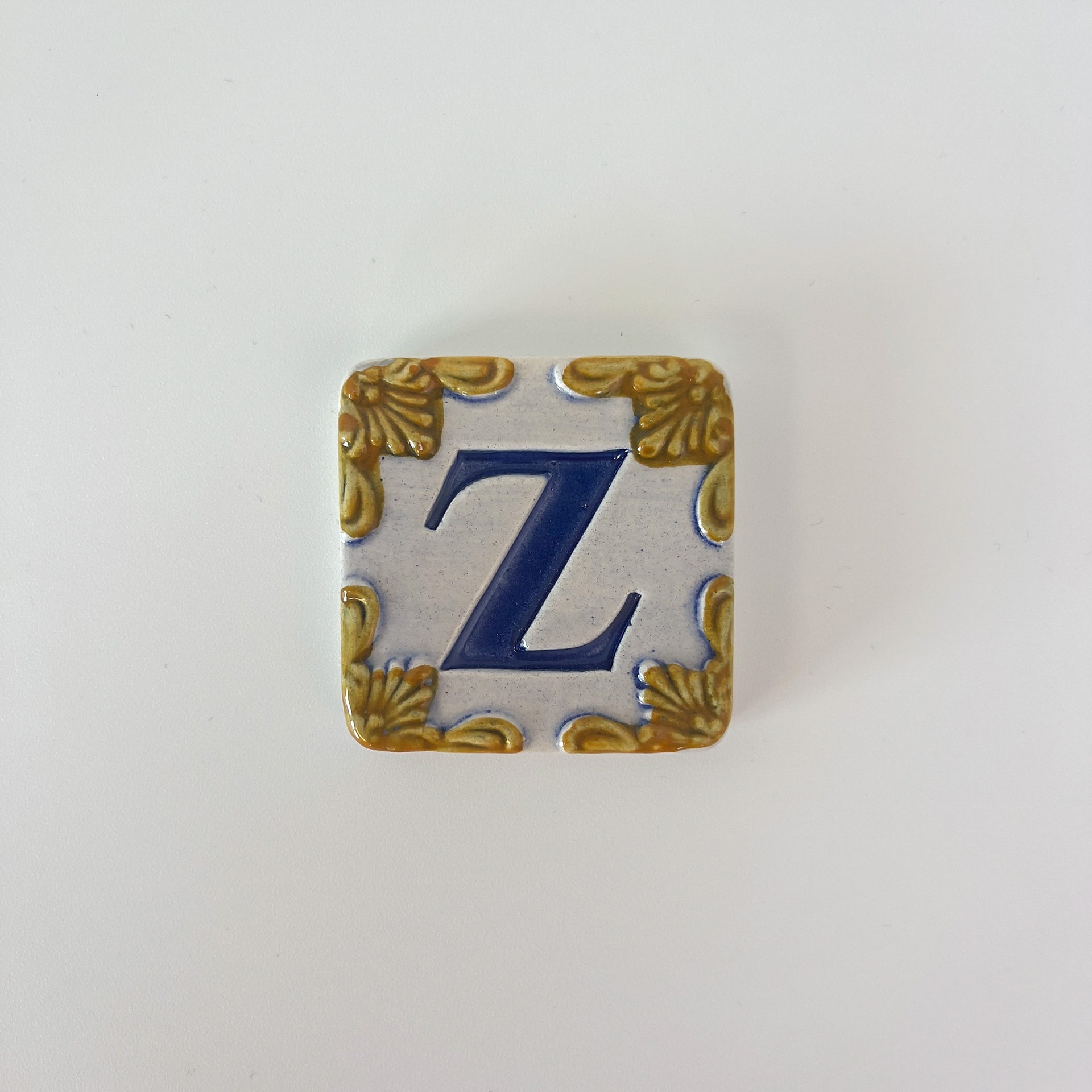 Ceramic door number and letter tile