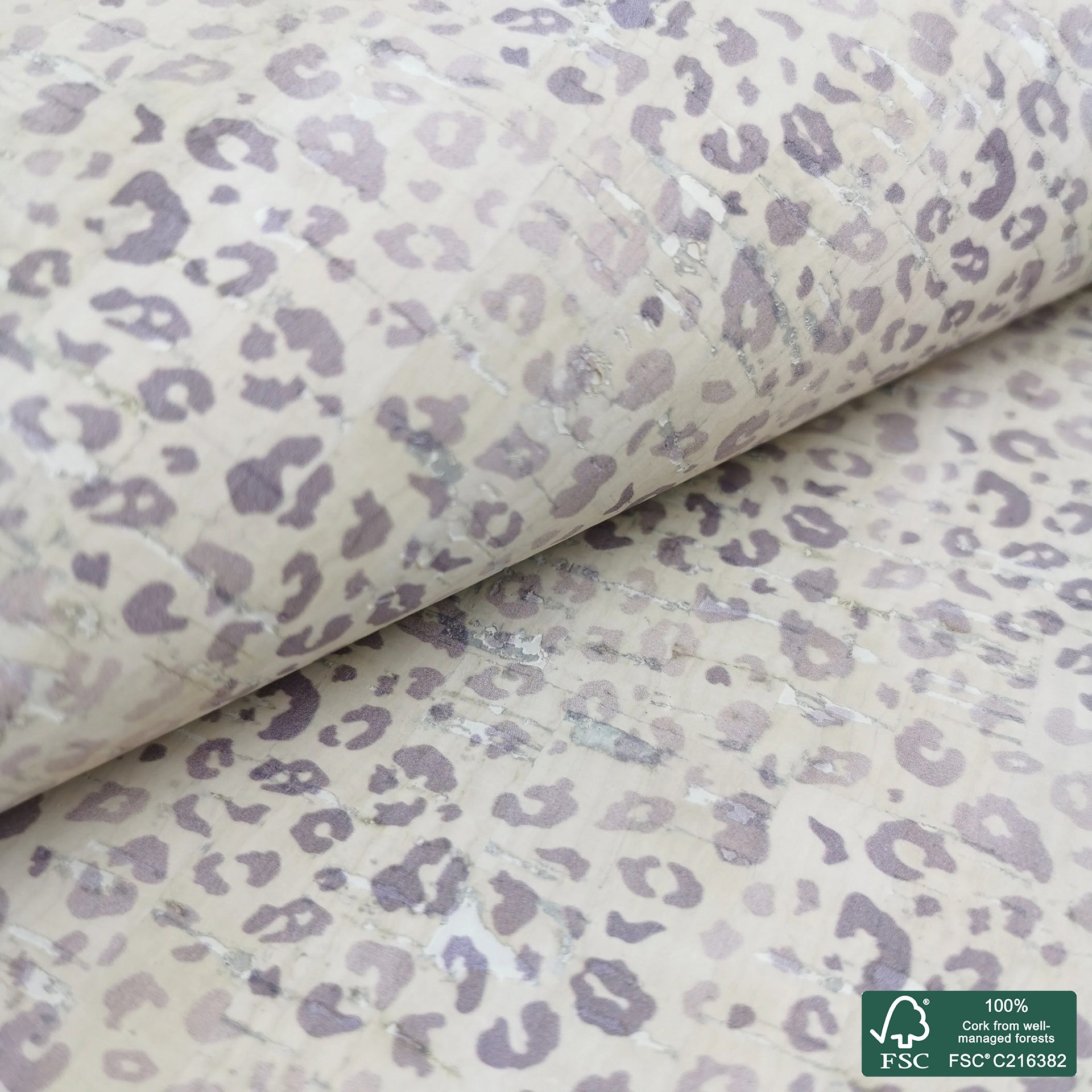 Leopard printed pattern on white cork fabric (163F)