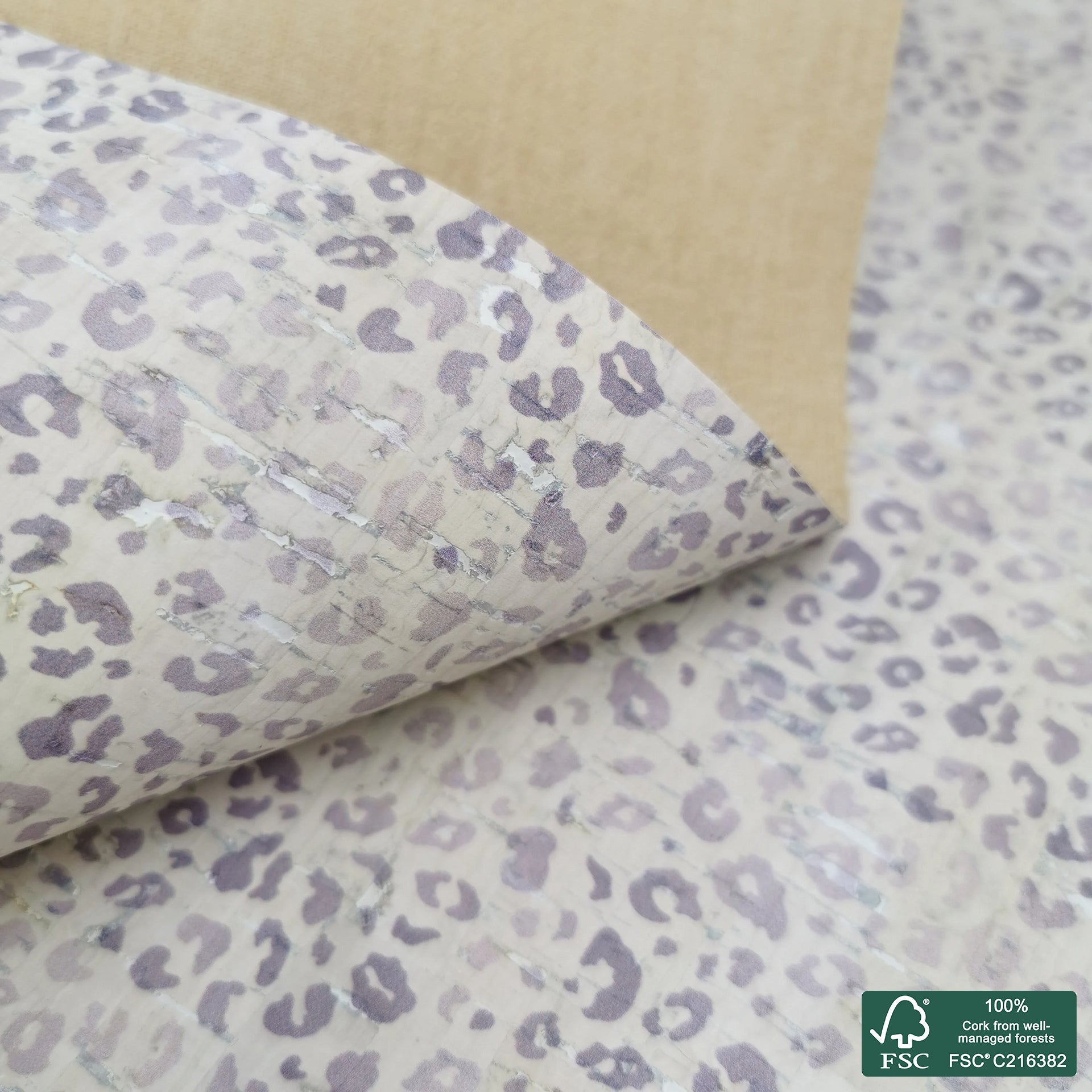 Leopard printed pattern on white cork fabric (163F)