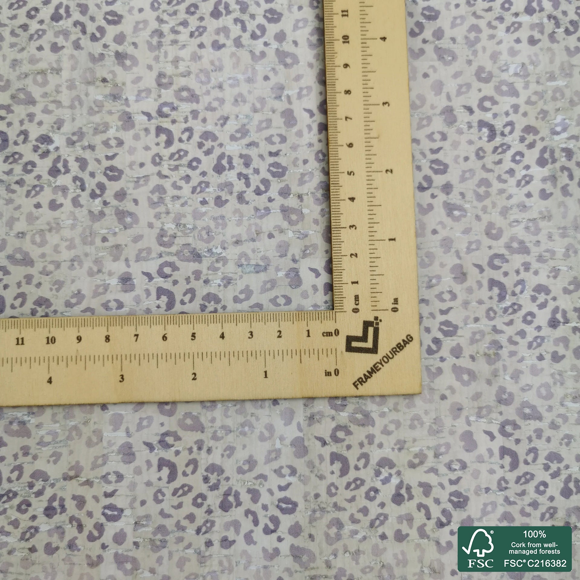 Leopard printed pattern on white cork fabric (163F)