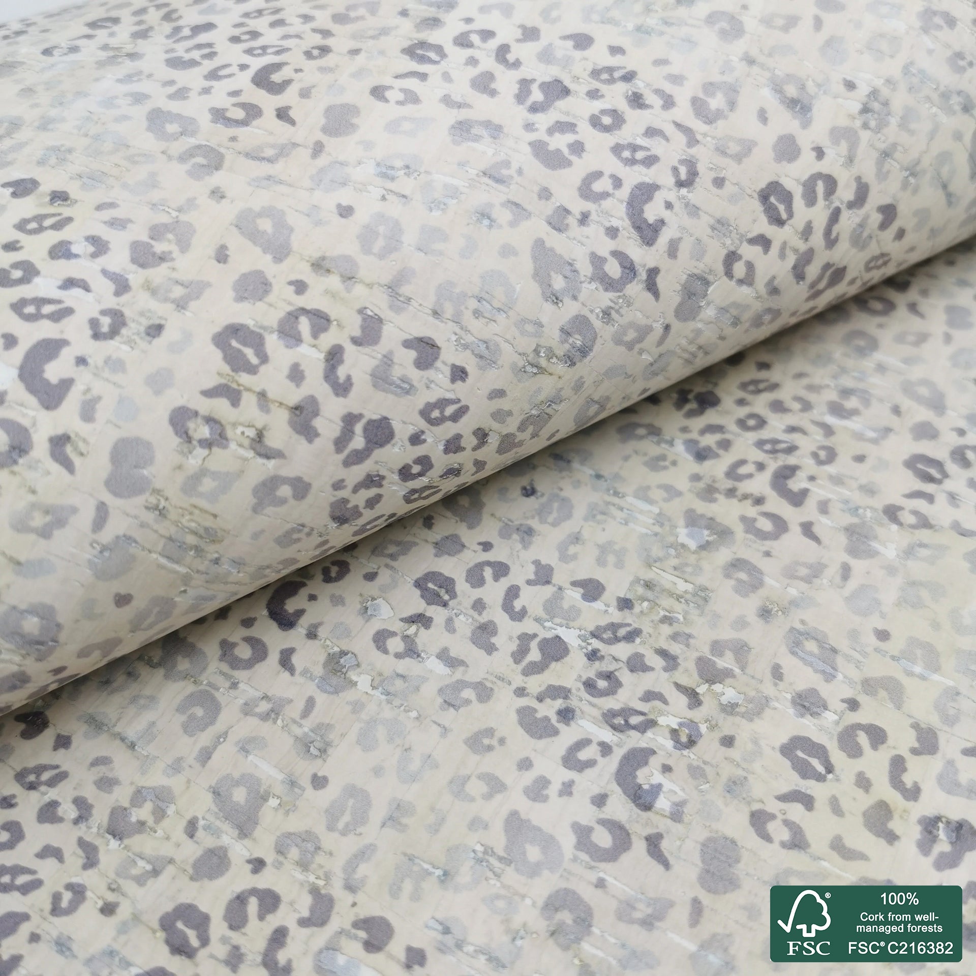 Leopard printed pattern on white cork fabric (163H)