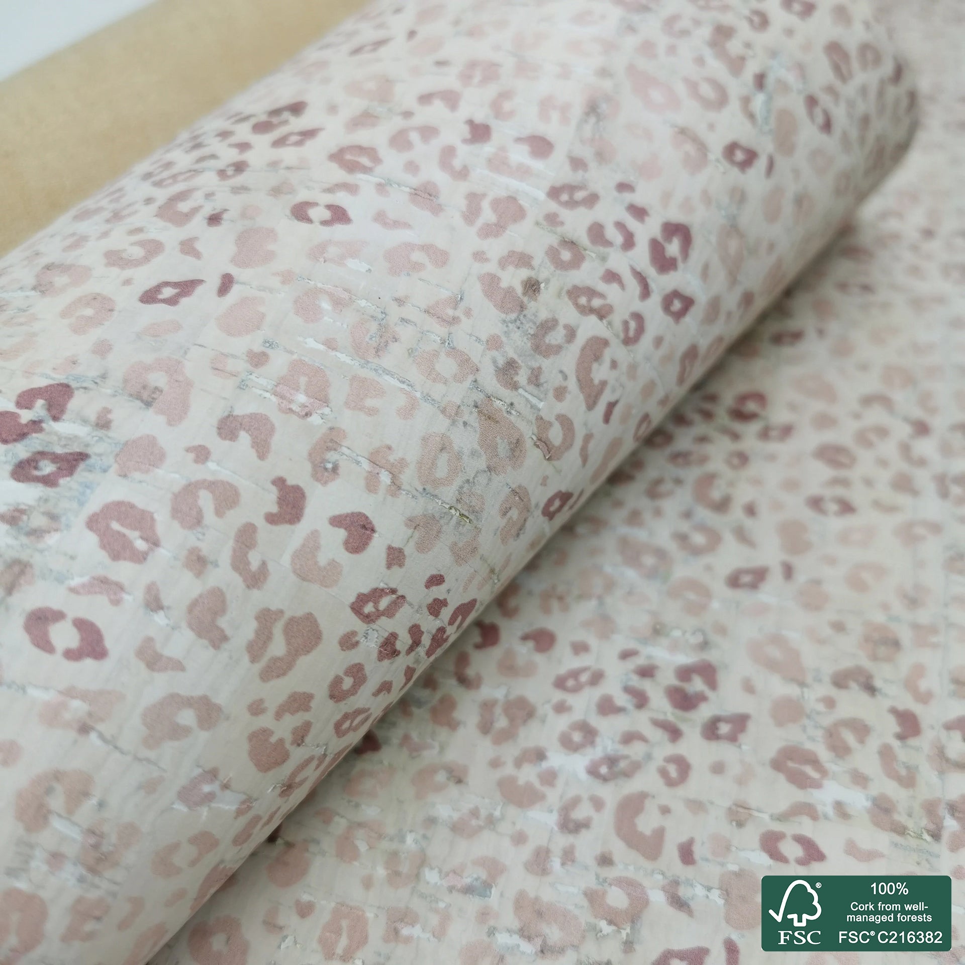 Leopard printed pattern on white cork fabric (163C)
