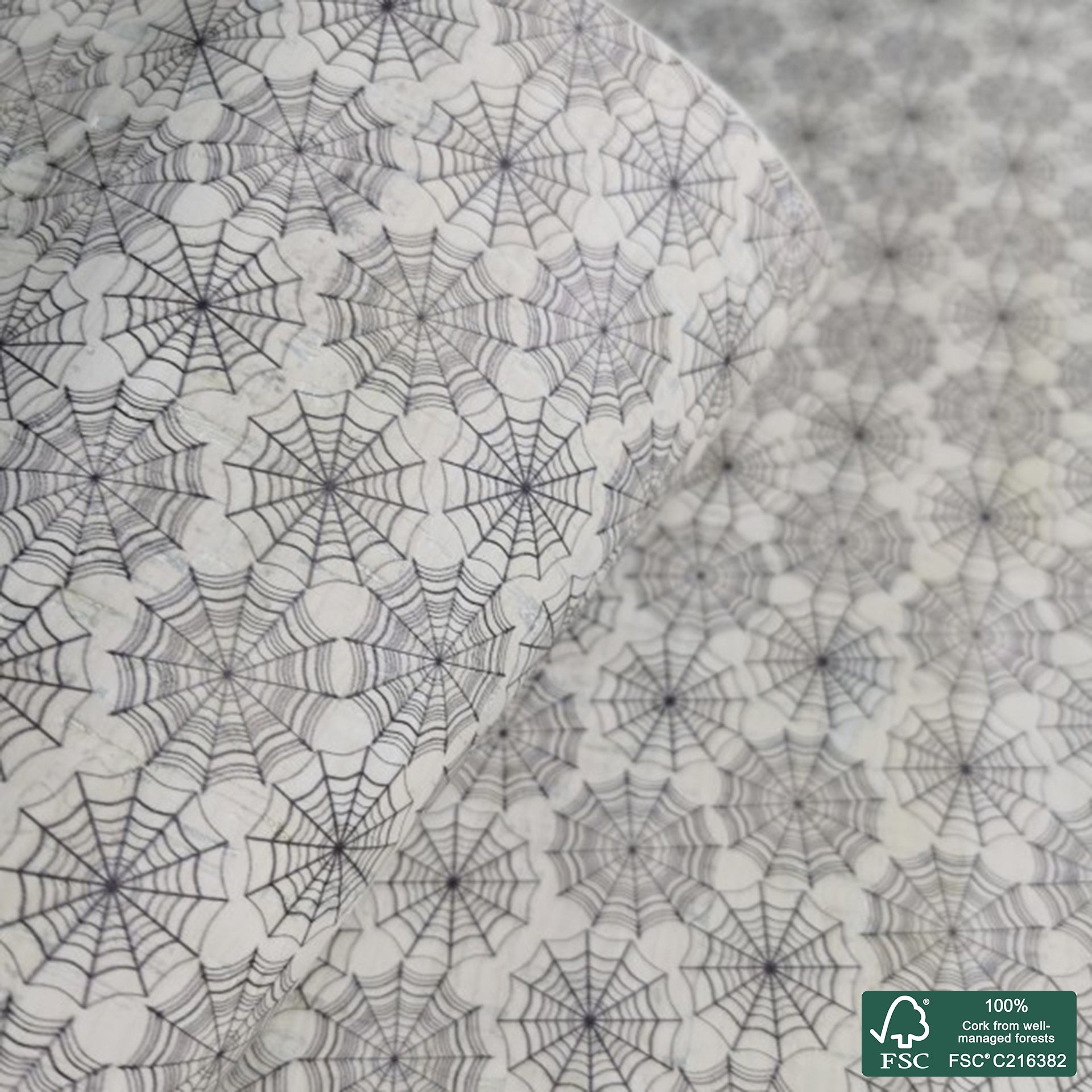 Cobwebs printed pattern on white cork fabric (202)