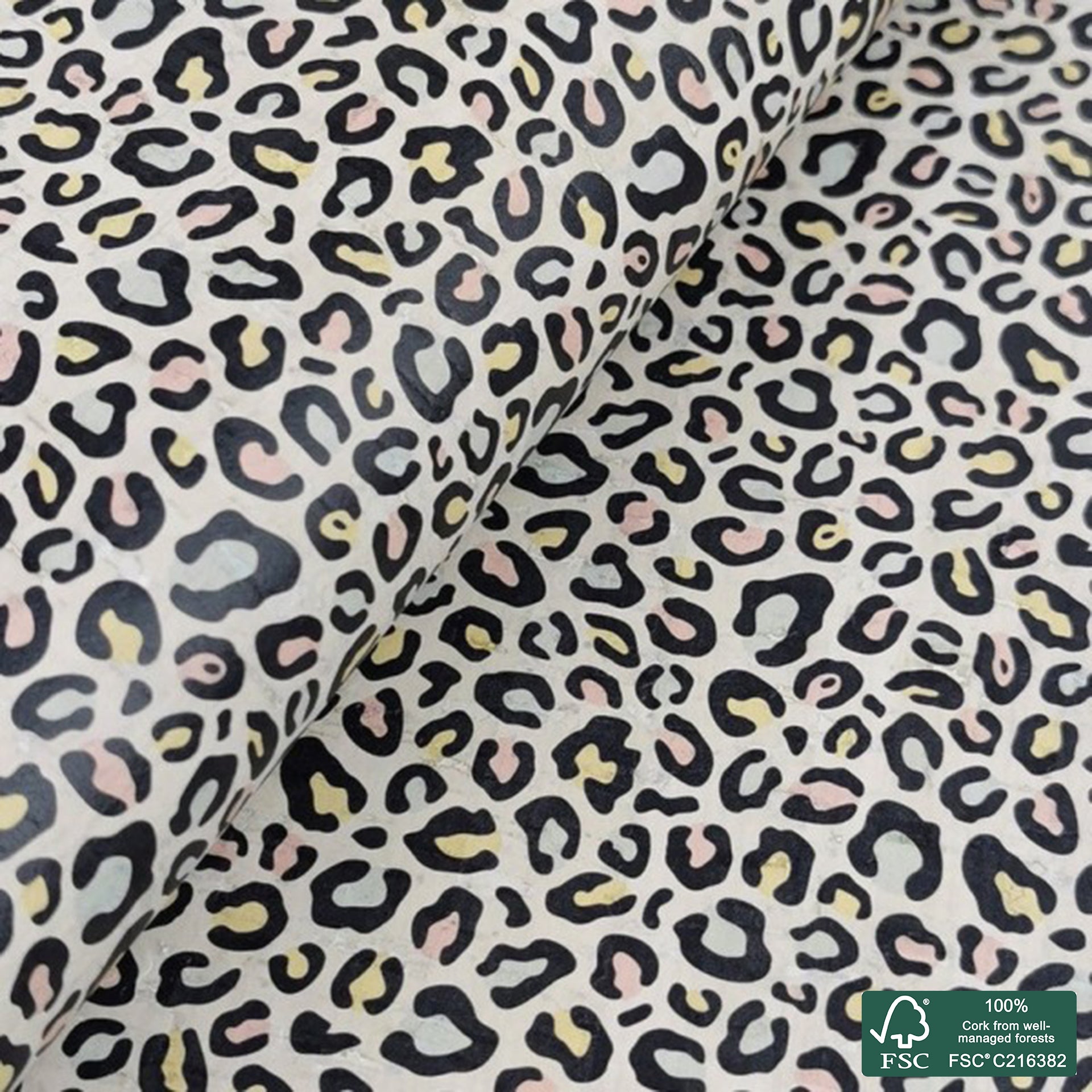 Leopard printed pattern on white cork fabric (250)