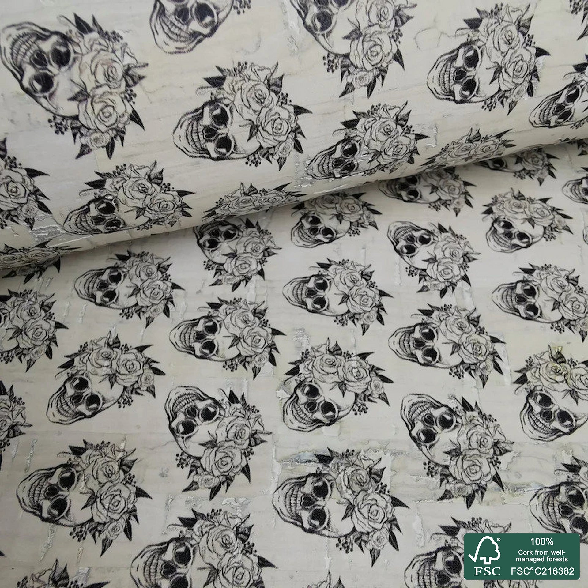 Skulls printed pattern on white cork fabric (411)