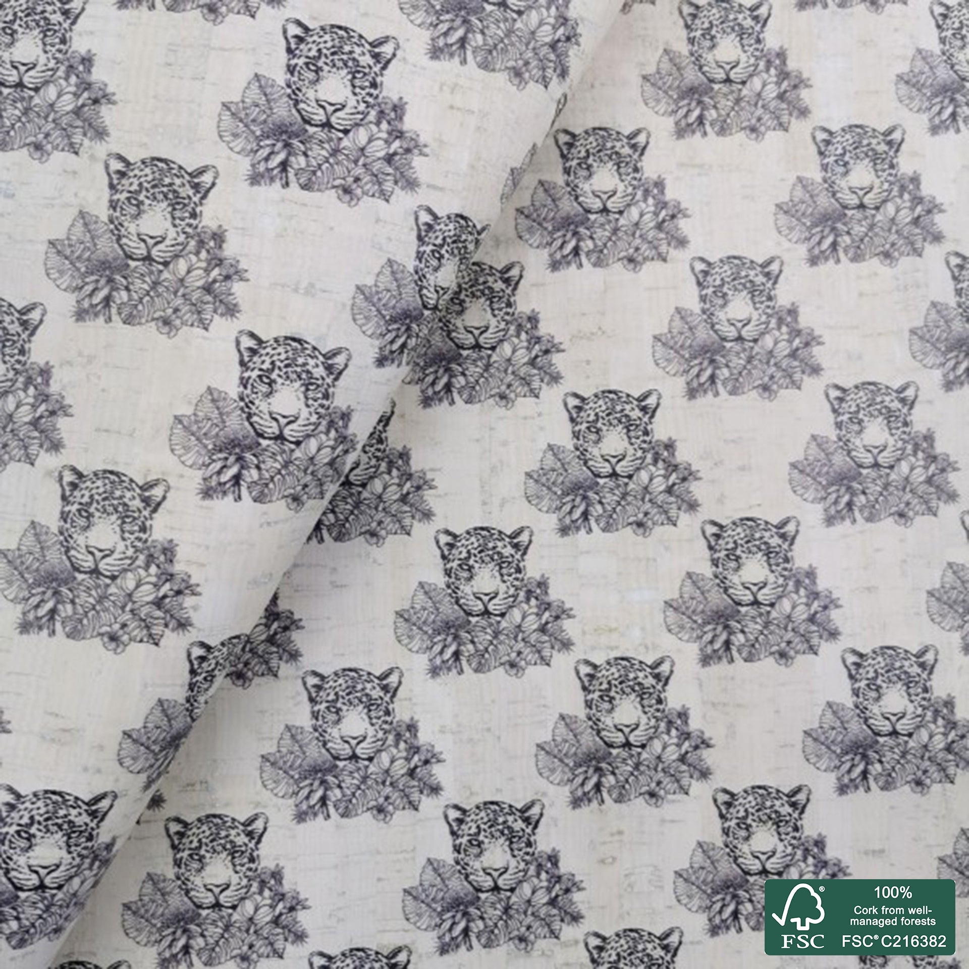 Cheetah printed pattern on white cork fabric (481)