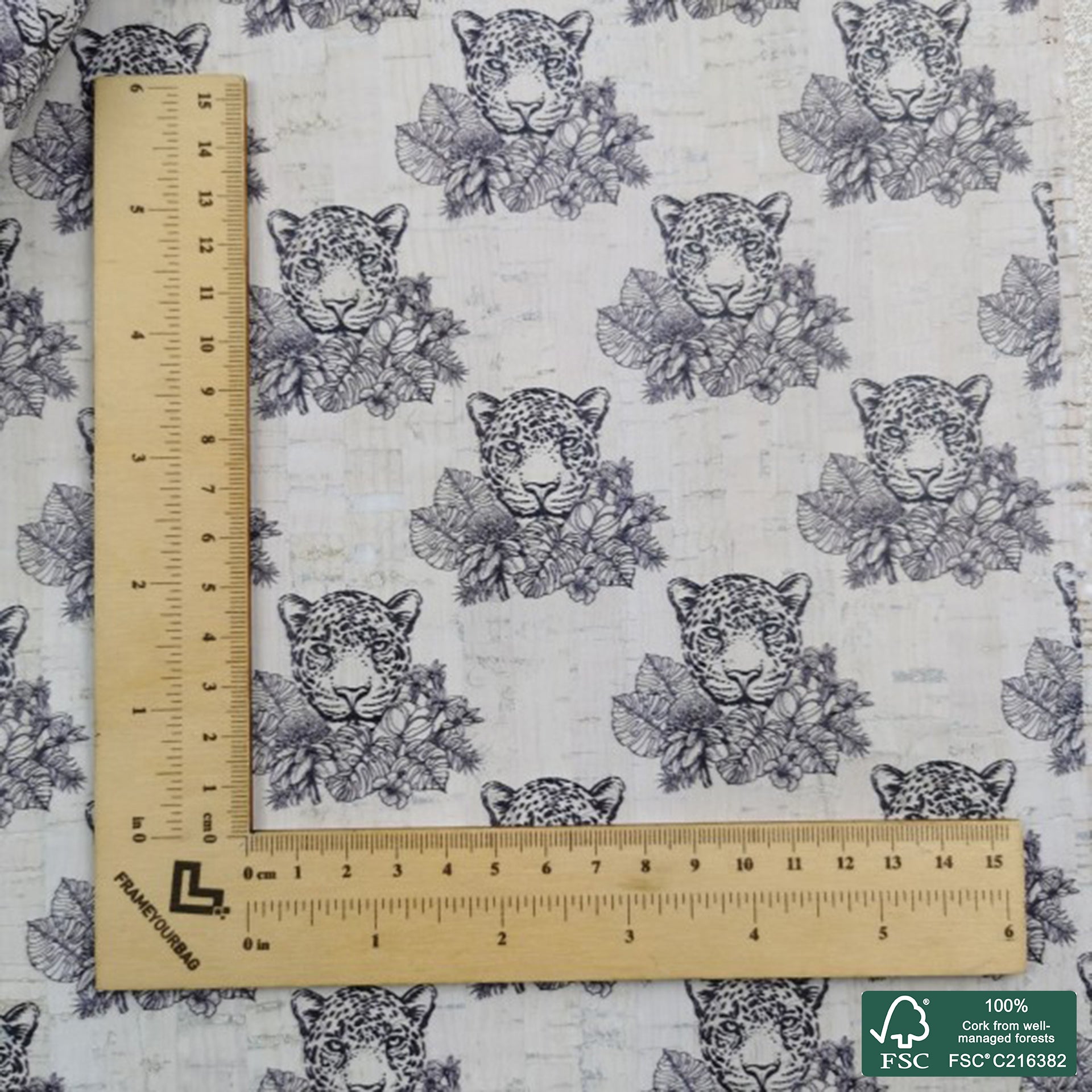 Cheetah printed pattern on white cork fabric (481)
