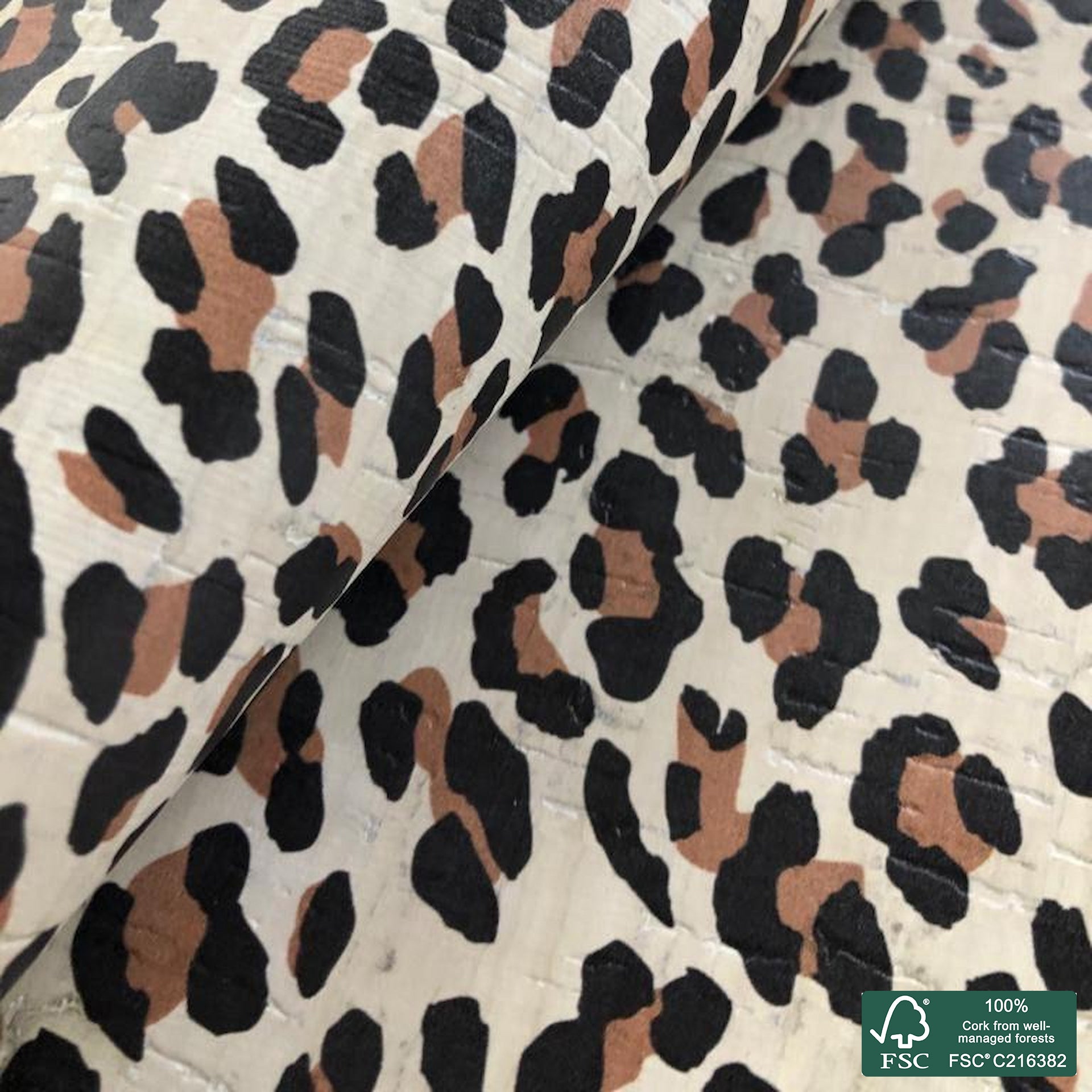 Leopard printed pattern on white cork fabric (535)