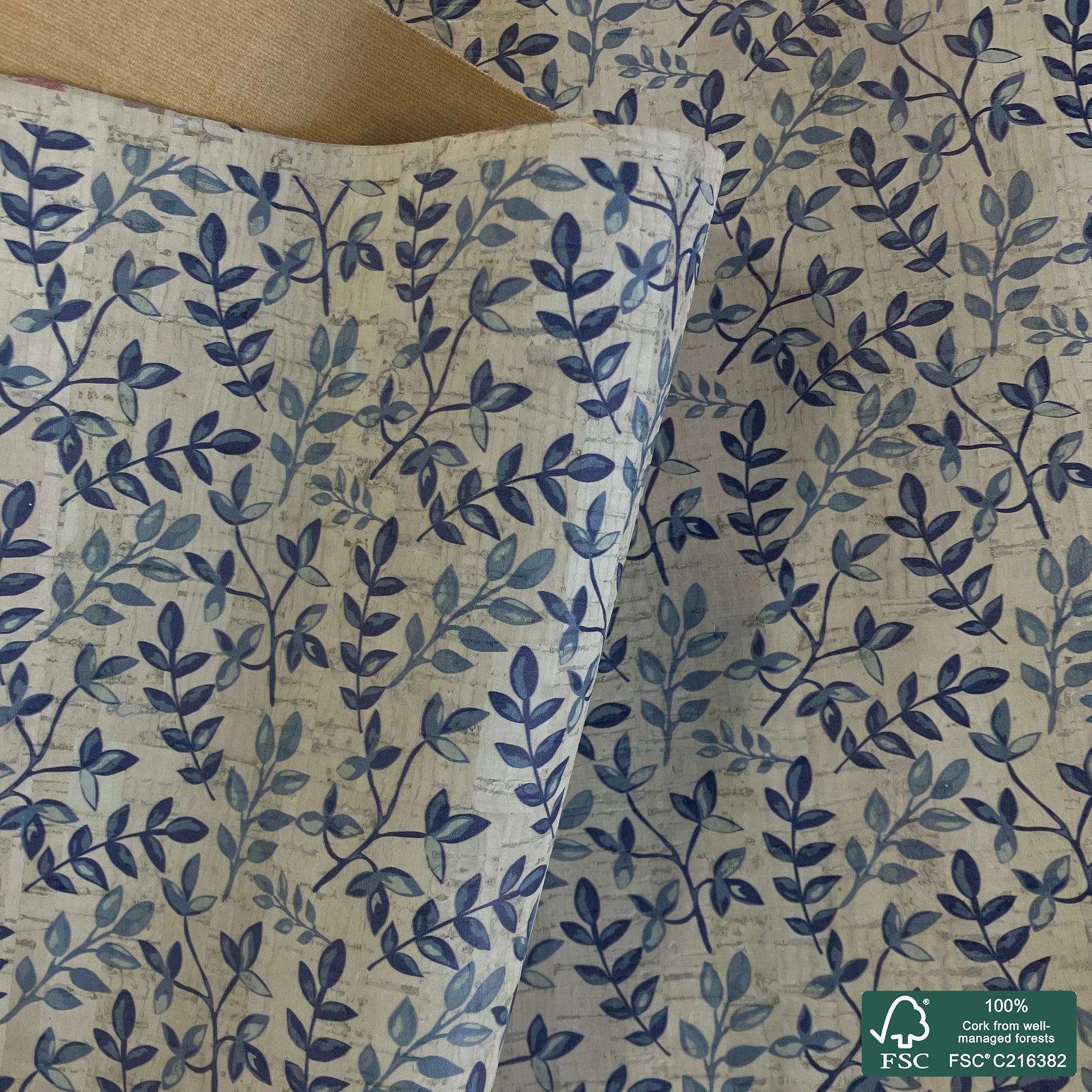 Leaves printed pattern on white cork fabric (548)