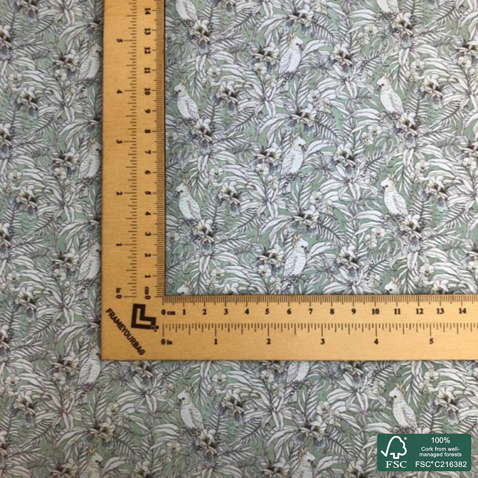 Parrot printed pattern on green aqua cork fabric (151)