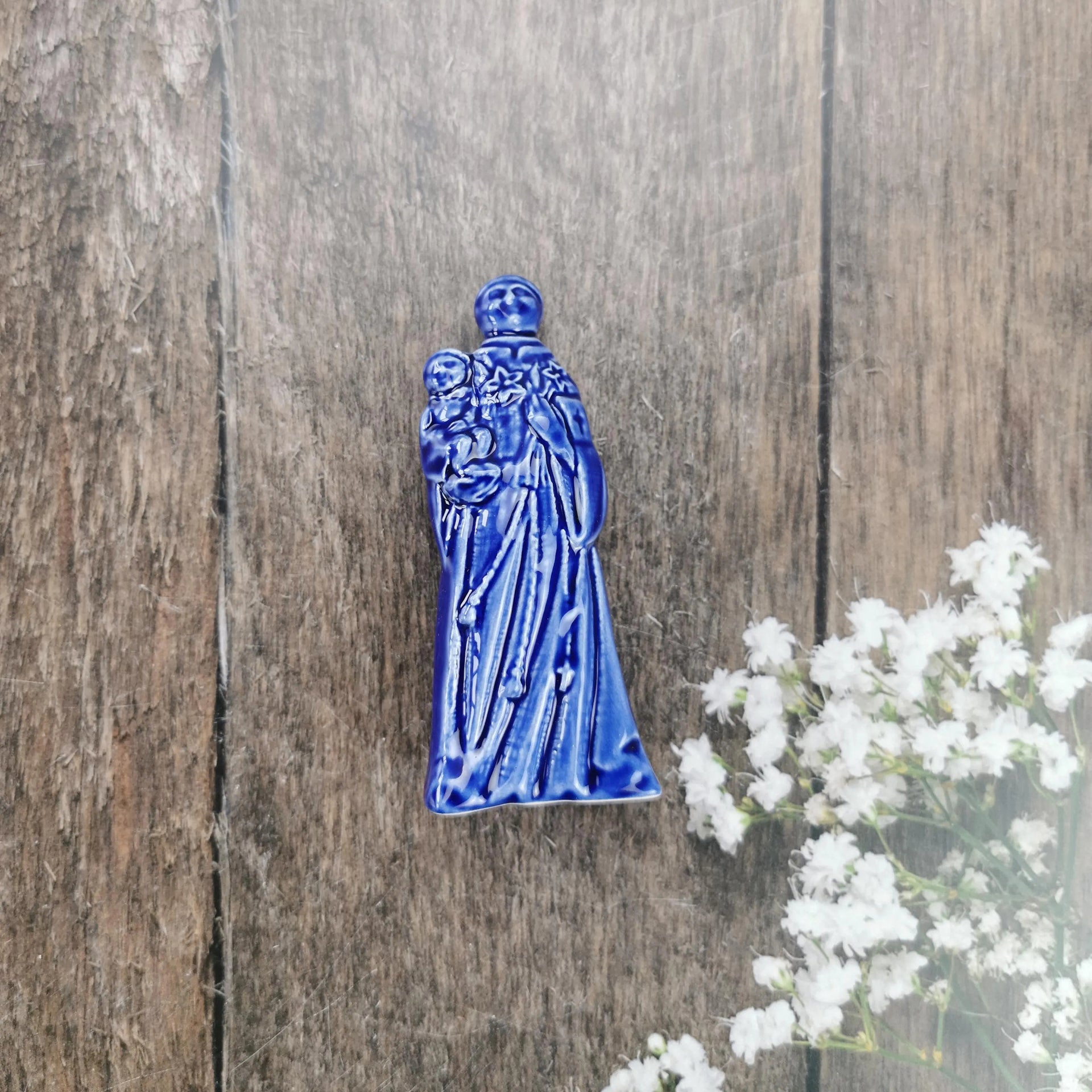 Blue faience figure of Saint Anthony