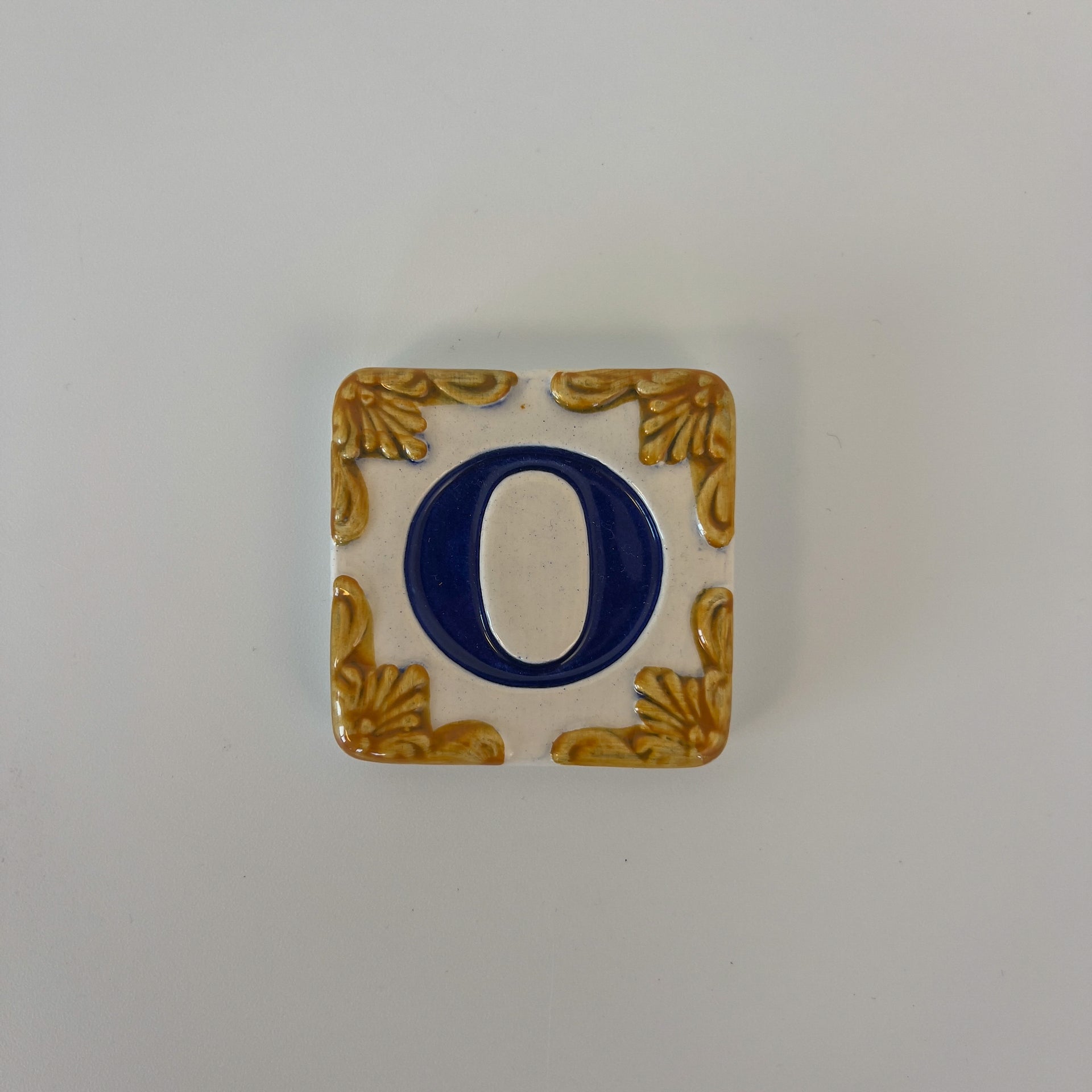 Ceramic door number and letter tile