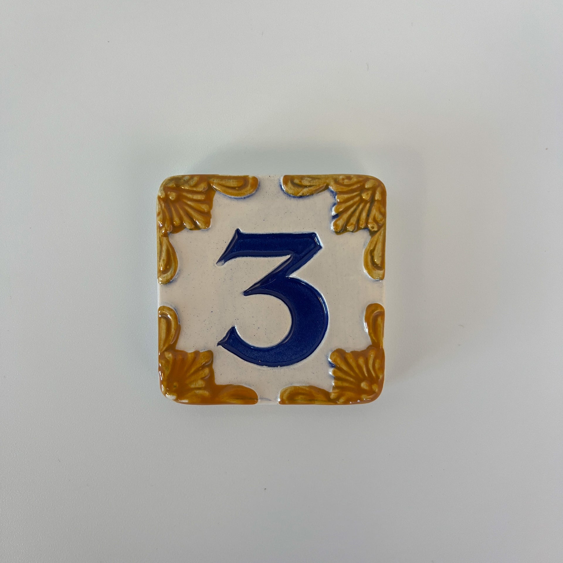 Ceramic door number and letter tile