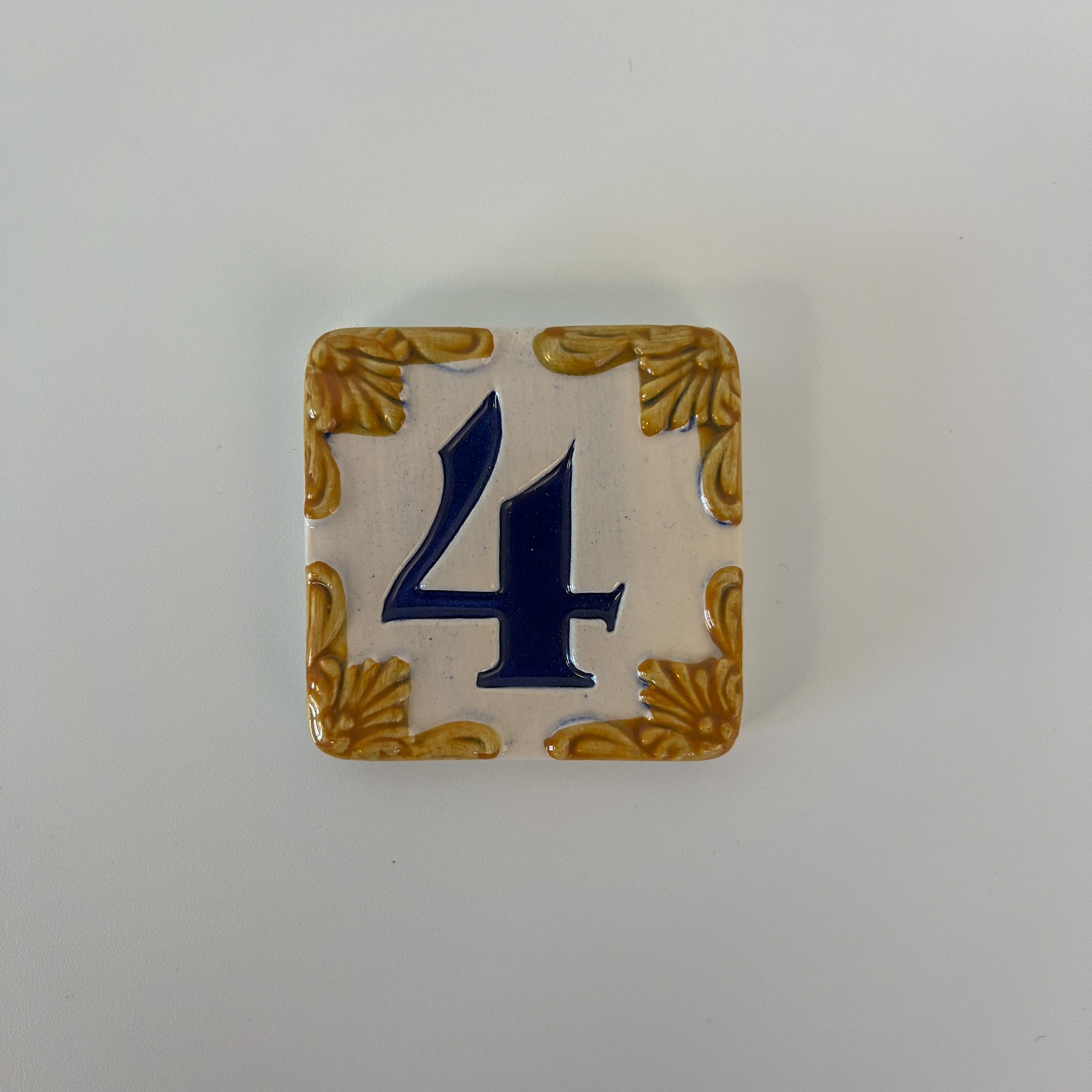 Ceramic door number and letter tile