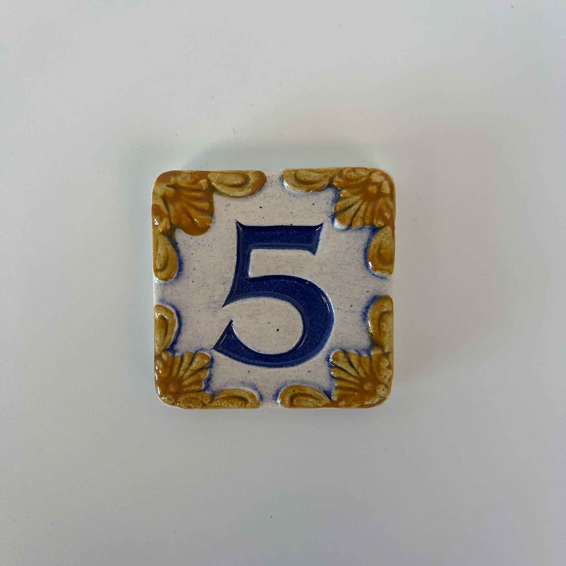 Ceramic door number and letter tile