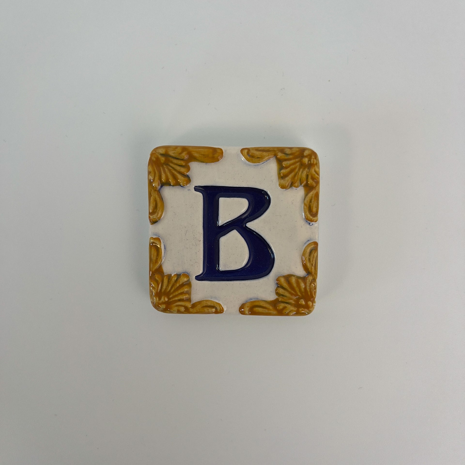 Ceramic door number and letter tile