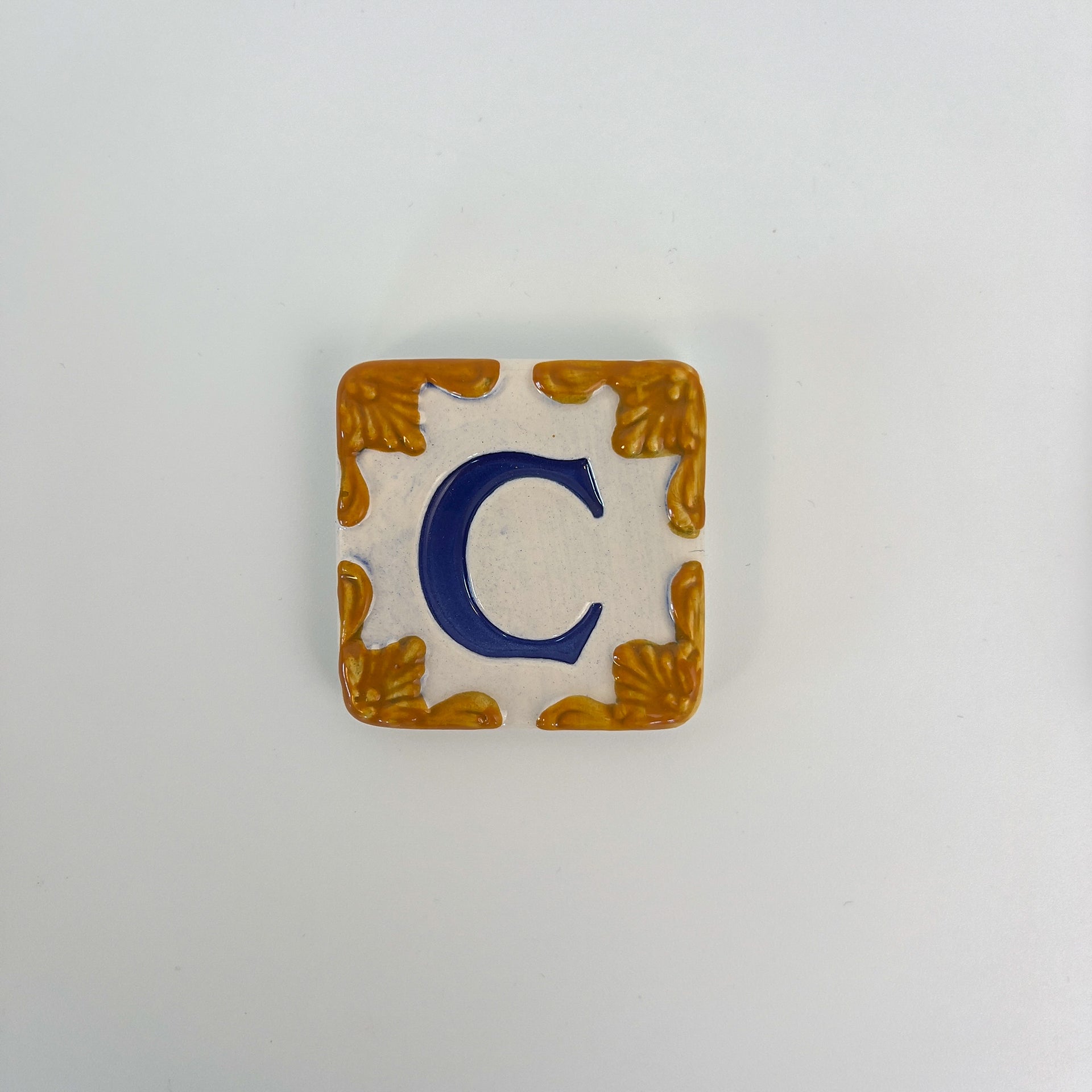 Ceramic door number and letter tile