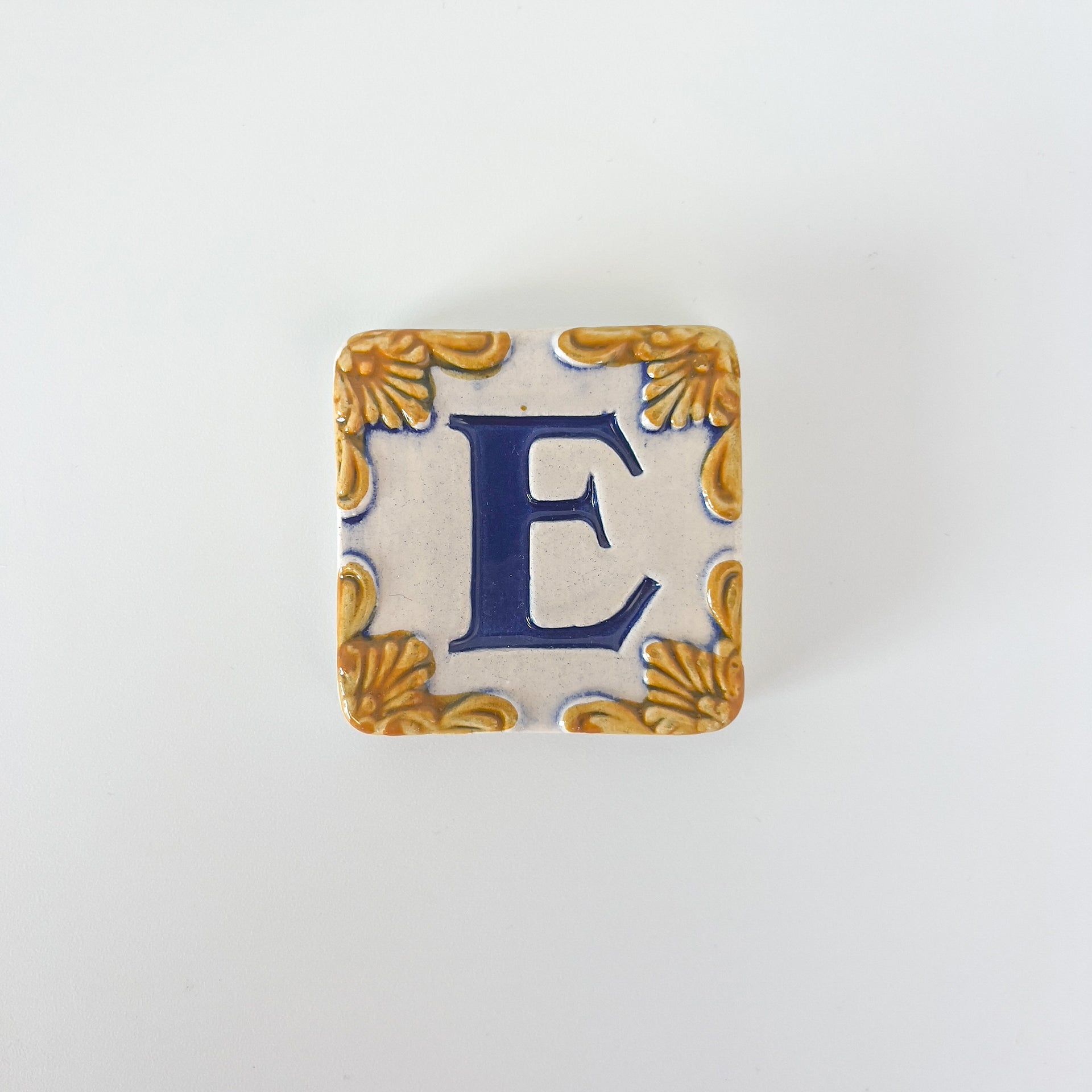 Ceramic door number and letter tile