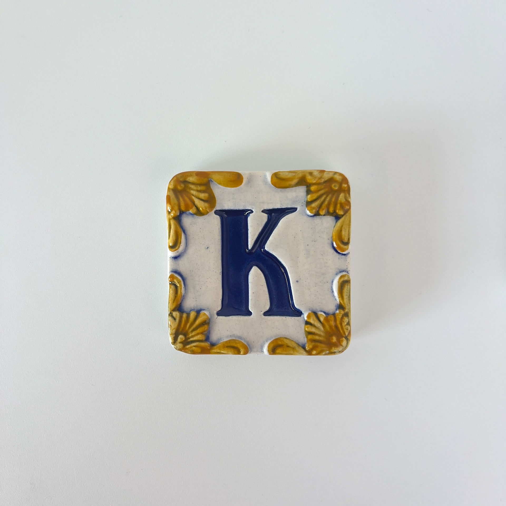 Ceramic door number and letter tile