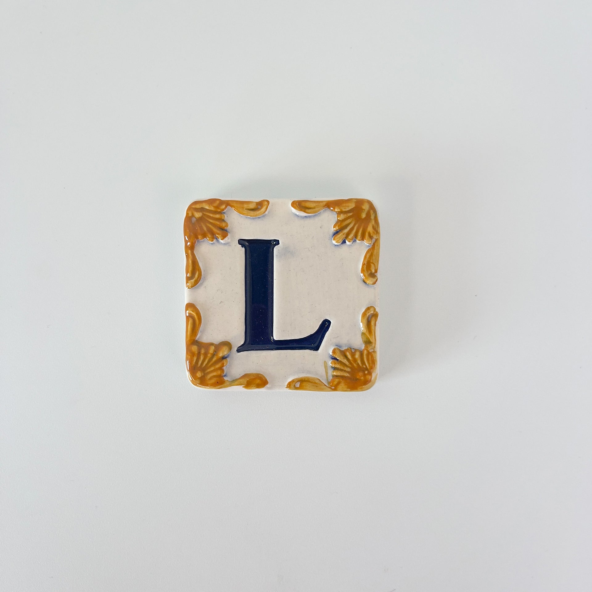 Ceramic door number and letter tile