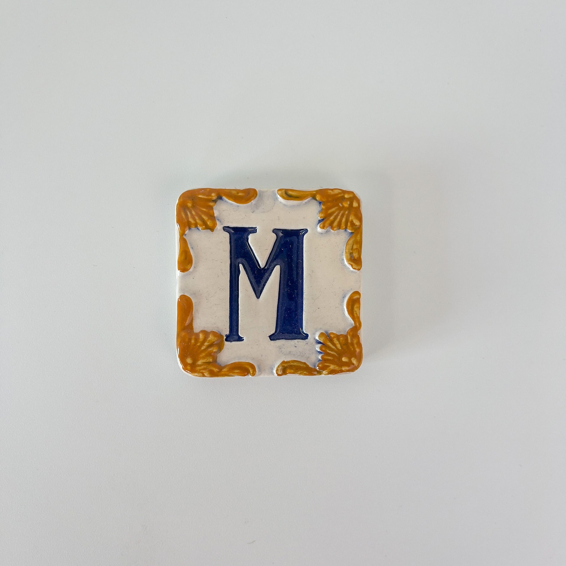 Ceramic door number and letter tile