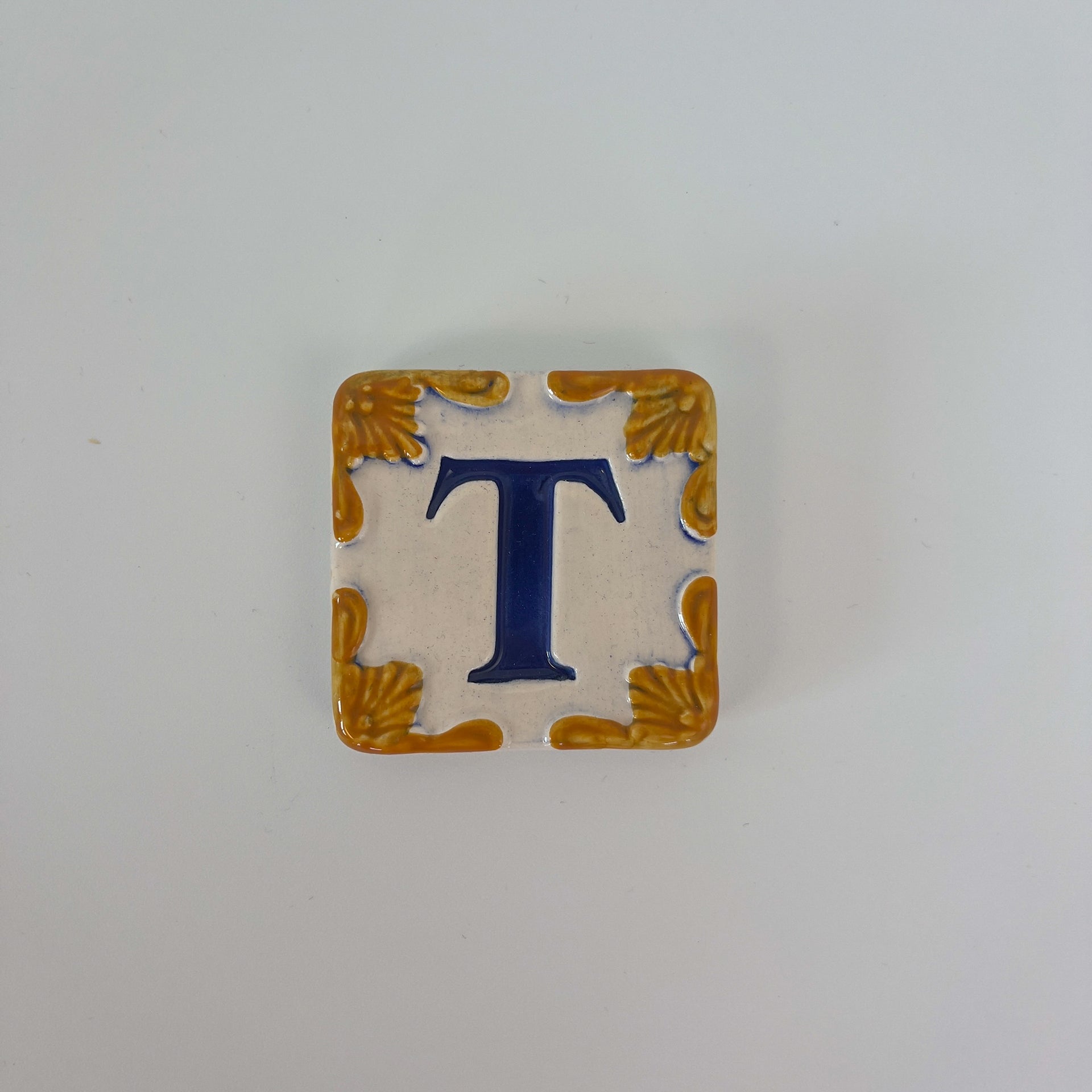 Ceramic door number and letter tile